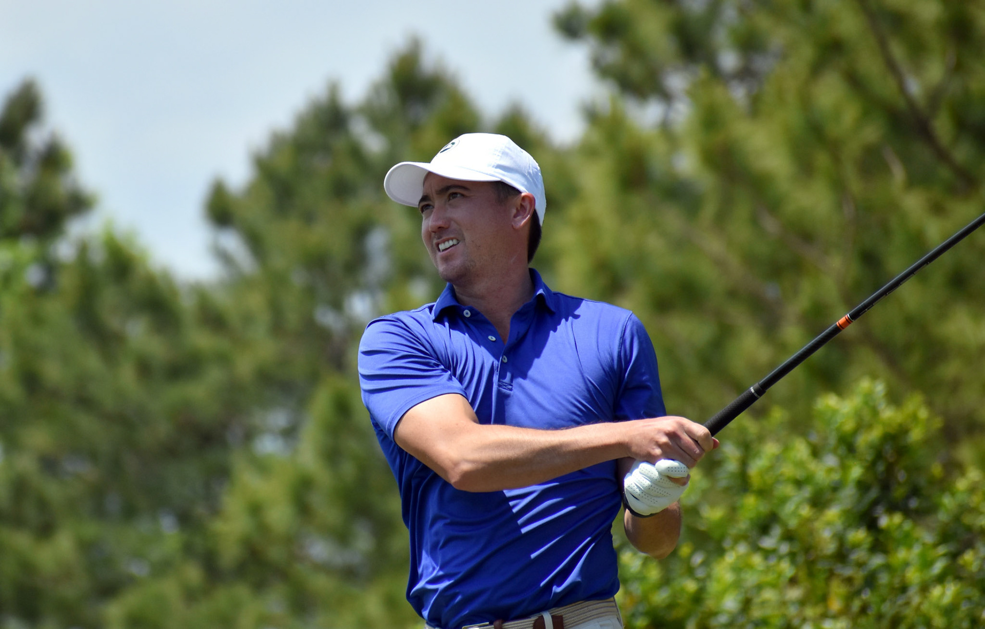 Harold Dill III tees off on 9.