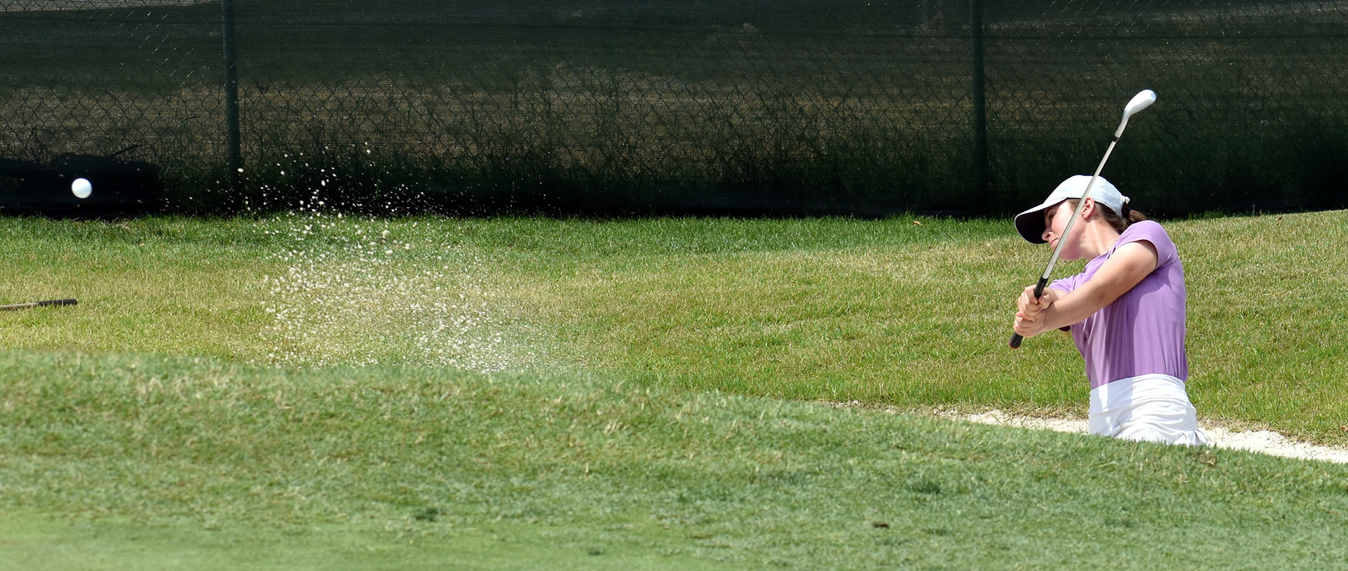 Alyssa Montgomery blasts out of a bunker on 11.