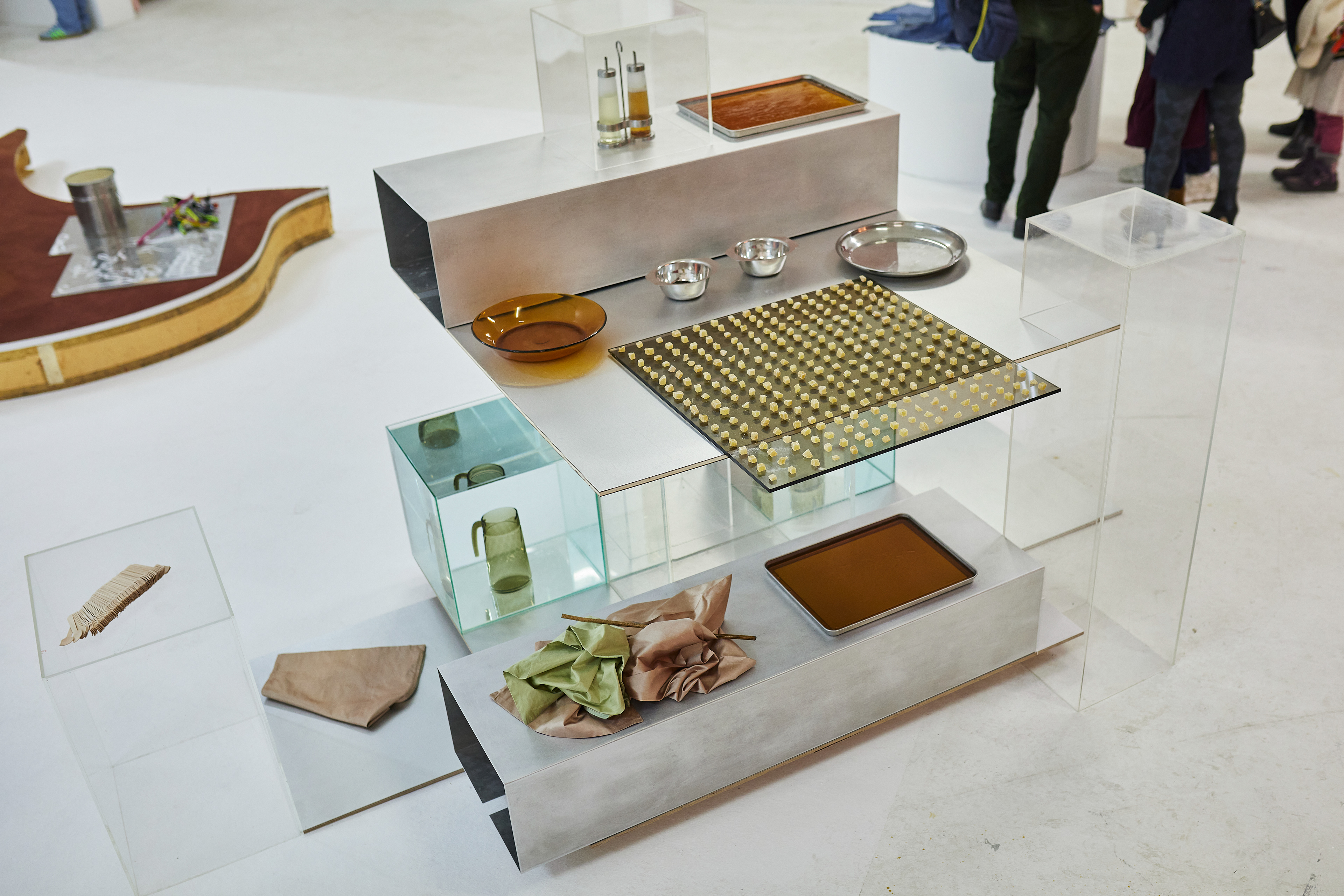 Culinary Intervention and installation from artist Sarai Rose Duke. Candied ginger and lapsing souchong agar-agar on stainless steel, plexiglass and smoked glass.