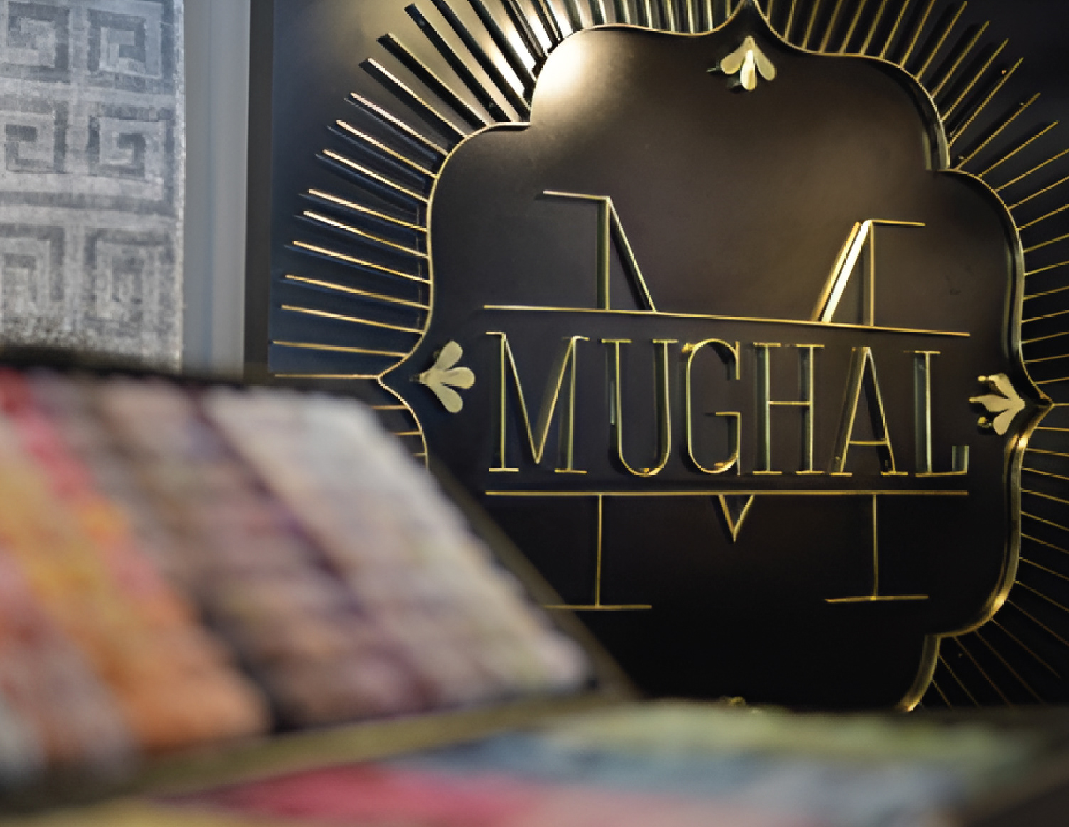 Visual identity design for Mughal, a brand in Mexico, featuring unique typography, color scheme, and branding elements.