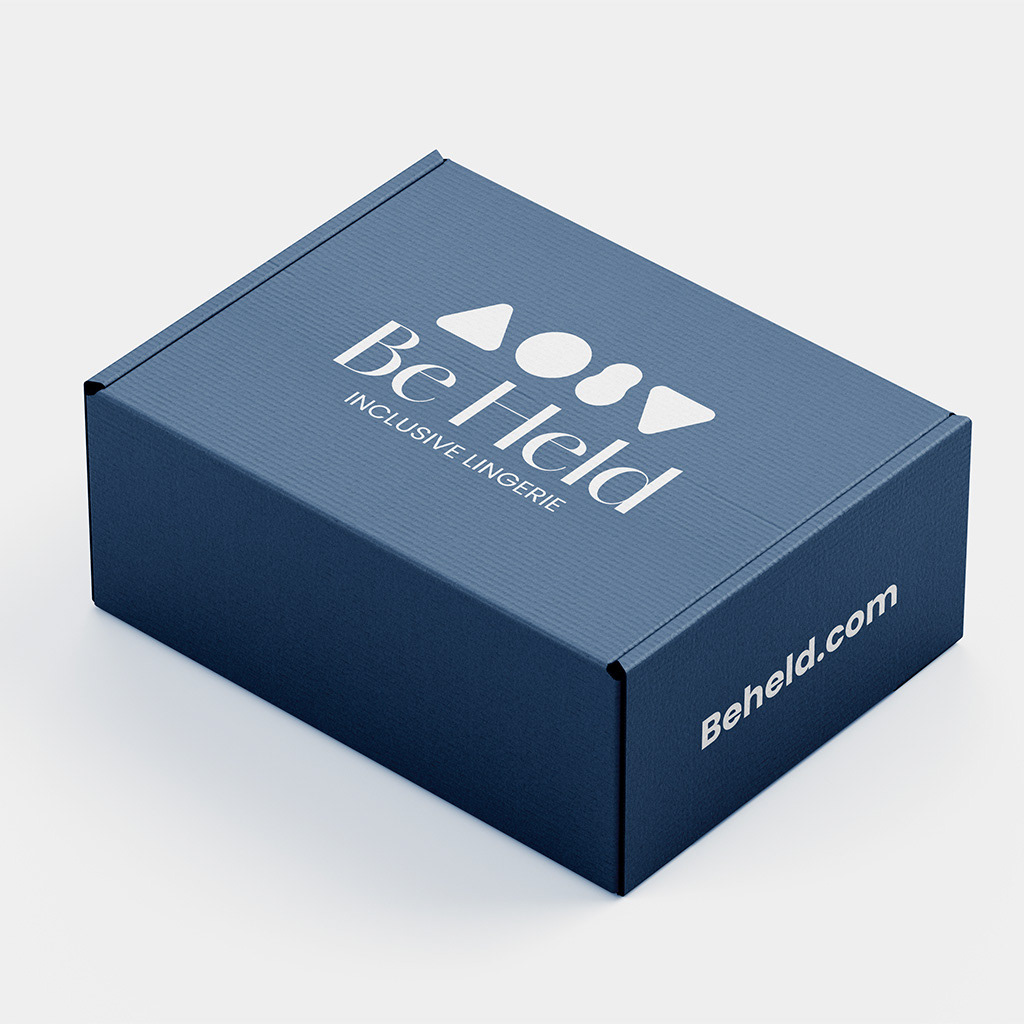 Packaging Be Held — tono Comet con logo e  quattro forme geometriche in rilievo.