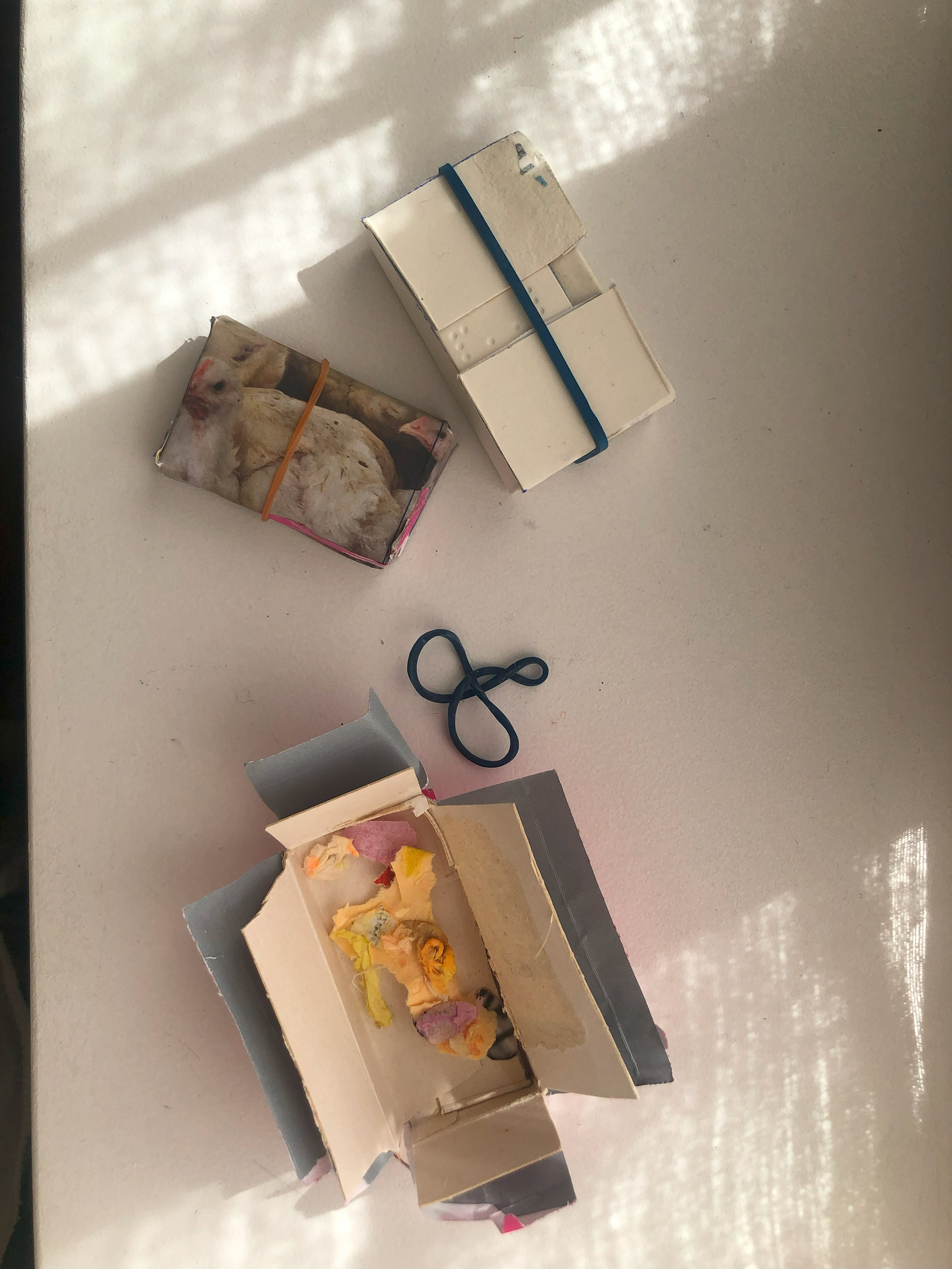 Collecting scraps of paper.