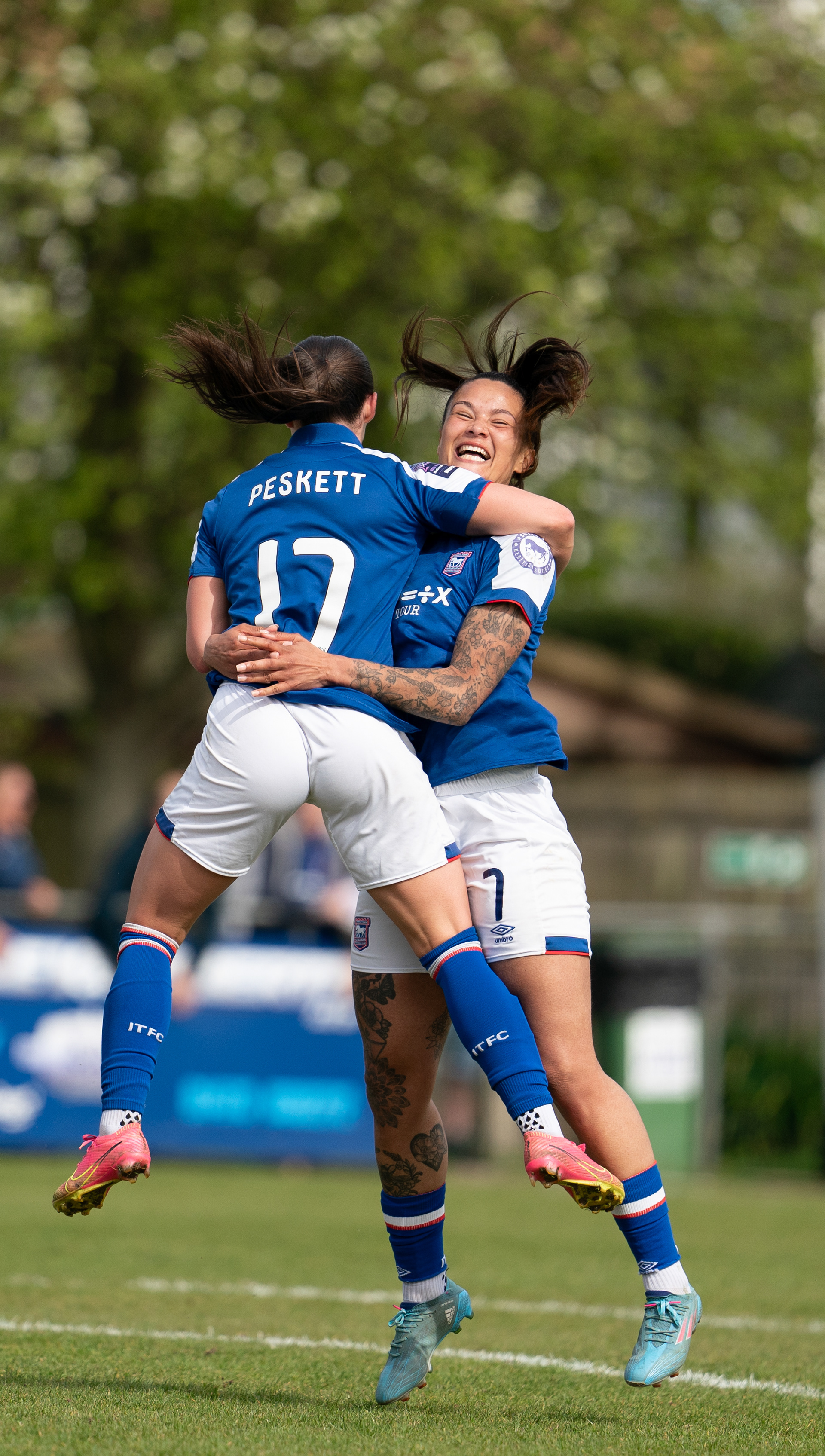 Natasha Thomas Celebrates her 150th goal with Sophie Peskett 