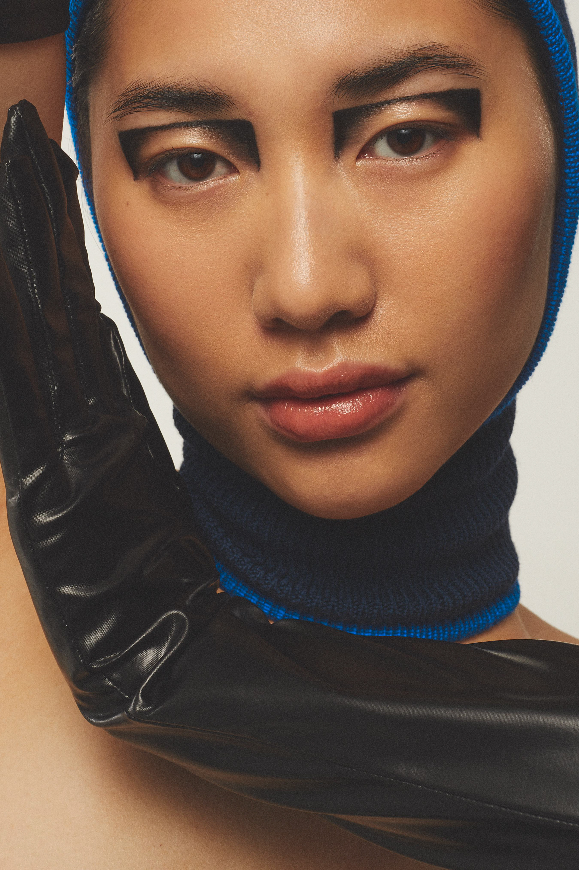 LETTER O - Photographer: Robbert Jacobs / Stylist: Isabella Aprilia / Makeup Artist: Fay Bio-Toura / Hair Stylist: Delphine Bonnet / Model: Emeline Ruan / Garments: Balaclava BRAK, Gloves STYLIST OWNED / Typeface: Rotonto Regular designed by Supernulla Creative Studio