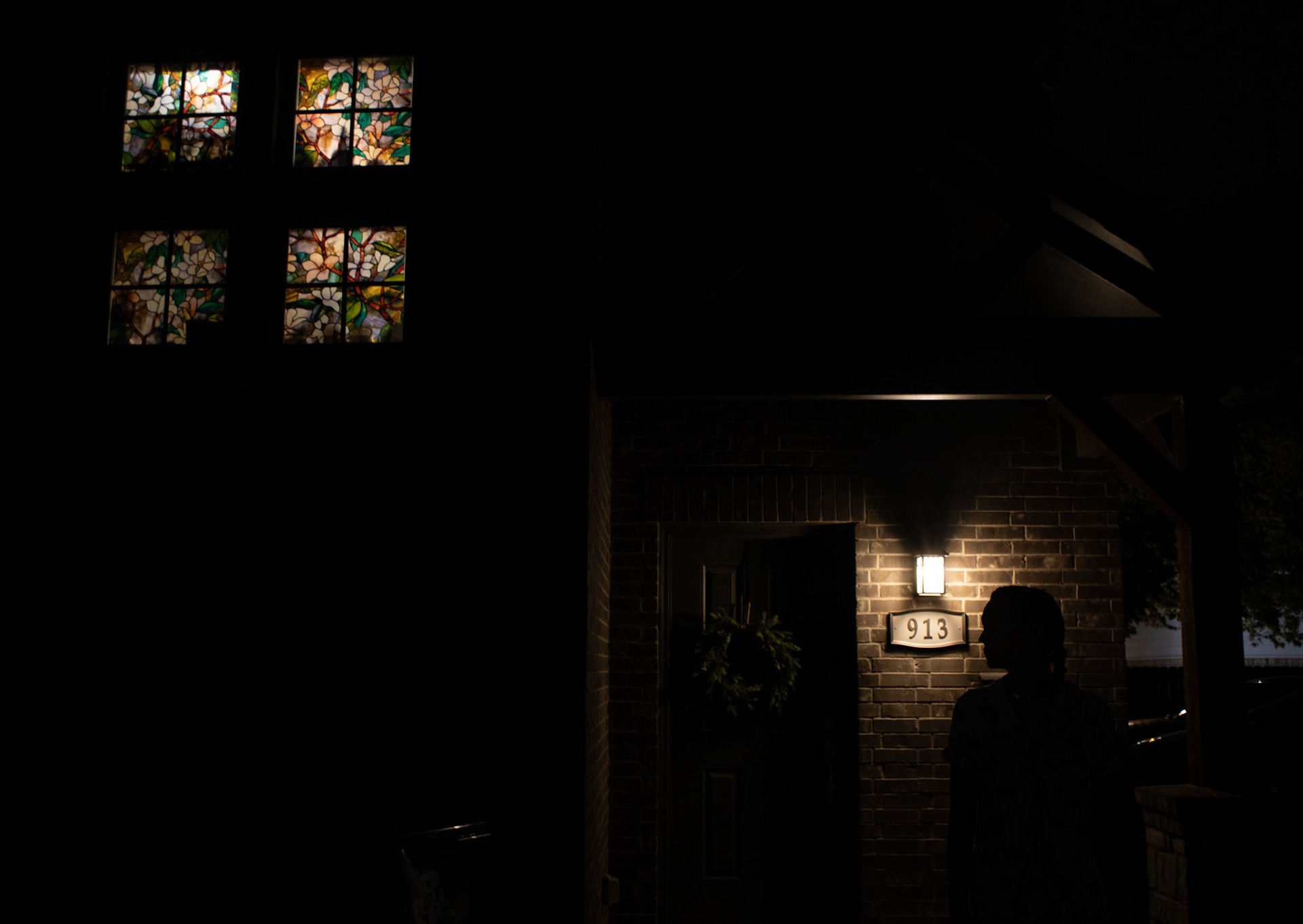 ACCEPTANCE- Reed finishes her day by taking out the trash on April 10, 2024 and ensures the front porch light is on. “I want to make sure my roommates and I will be safe and the house is clean so I can have a fresh start for the day tomorrow,” Reed said. “I believe that each day is a new beginning and that it is a new opportunity for growth and to be better than the day before.” Photo by Alaina Jones