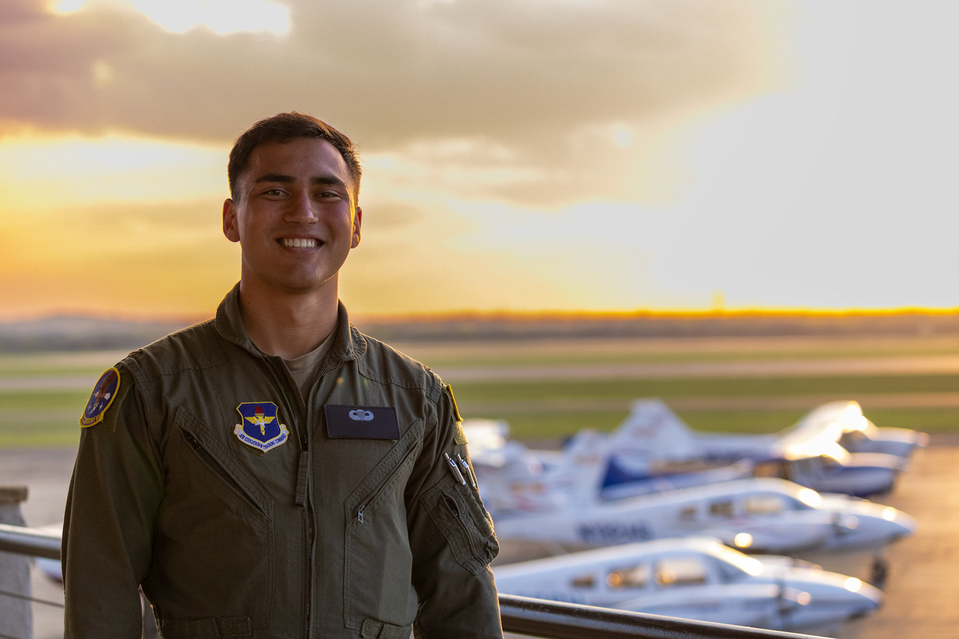 AWAITING TAKEOFF- A military flight student poses for a photo, March 25, 2025, at the Denton US Aviation Academy viewing deck. He is waiting for his instructor, Greg Hansen, to give flight approval, after a storm stirs in the area.  Photo by Alaina Jones
