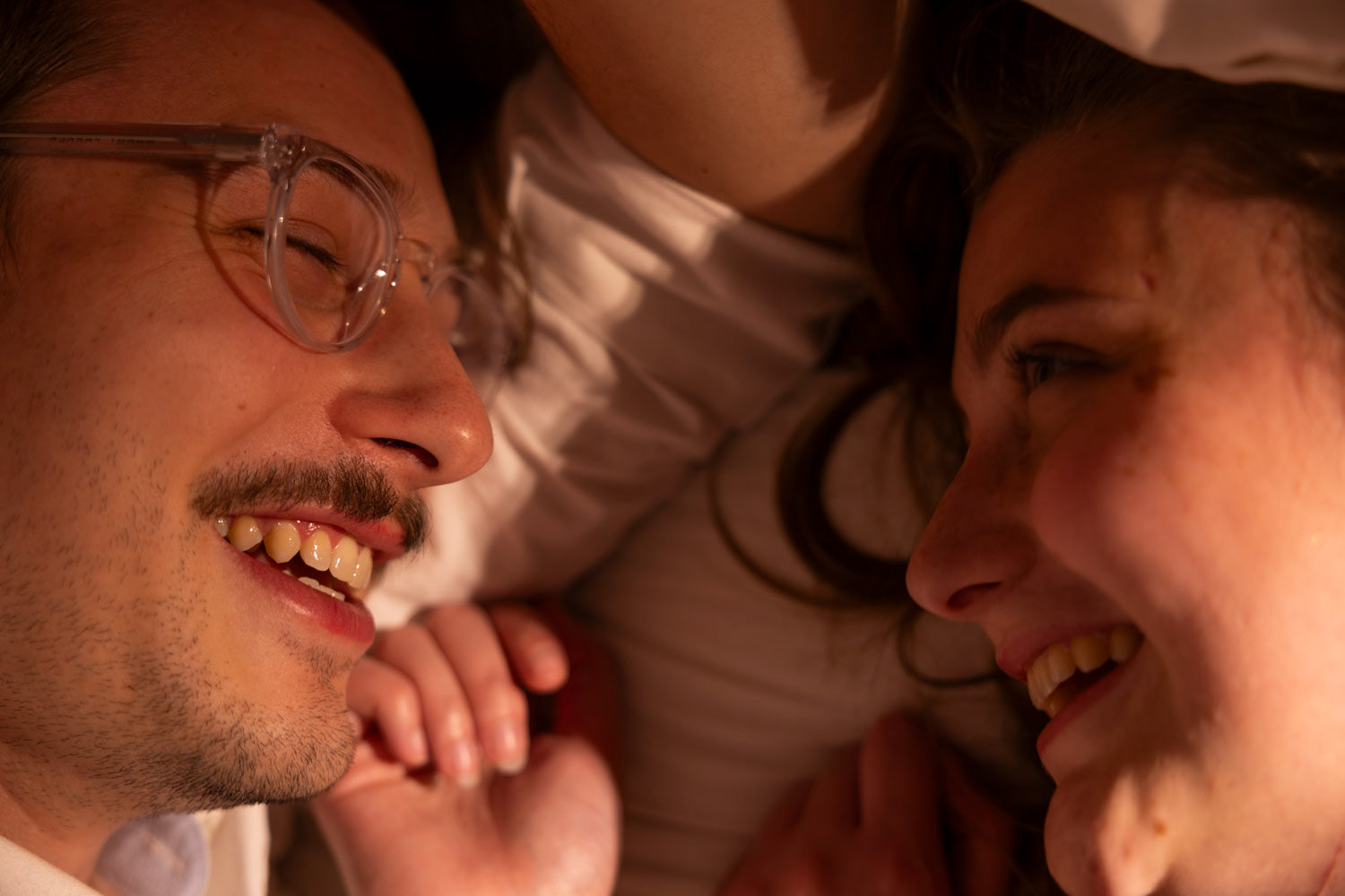 GROWTH-After a celebratory salsa dance and fort building on April 24, 2025, the couple takes a moment to laugh and explain how appreciative they are for their academic and personal growth. “I just can't believe they chose me for the award. I have worked so hard all semester, contributing in class, spending hours studying every single day, and it is just really amazing to see my work paid off and that it means something,” White said. “I was worried that I could not complete school because of my disabilities, but this recognition proves that you are capable and your disabilities do not define you.” Photo by Alaina Jones 