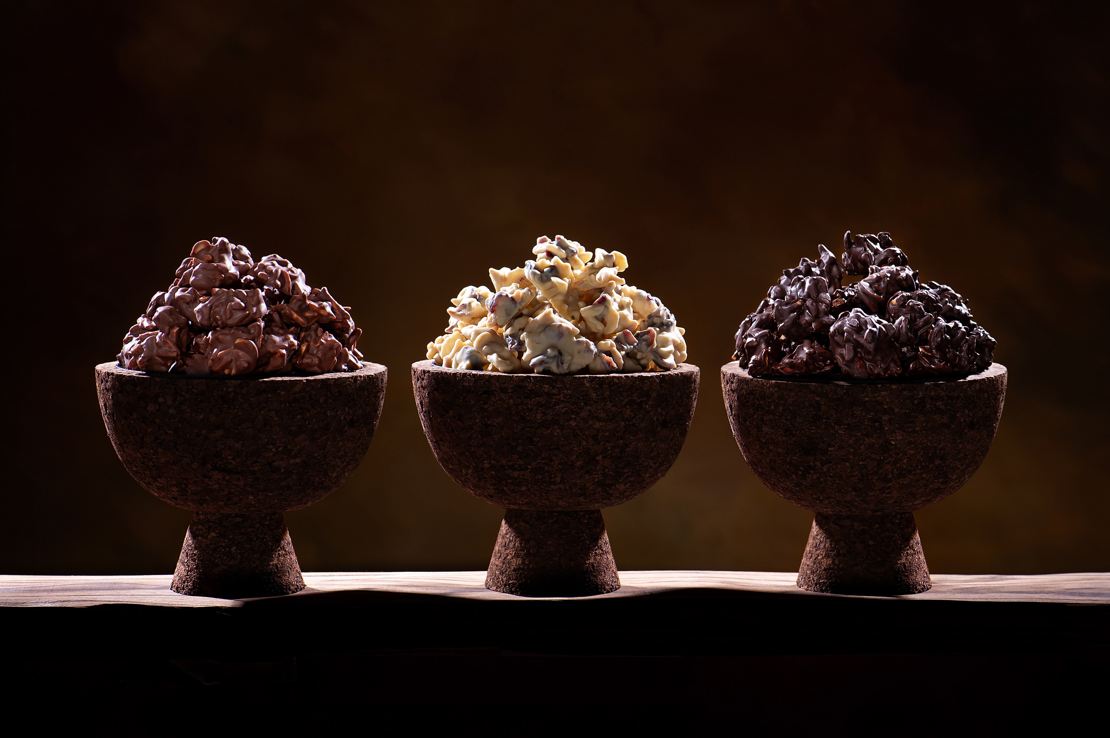 voula gkoti photography chocolate bites in various flavors in cork jars for laurence galerie of chocolat