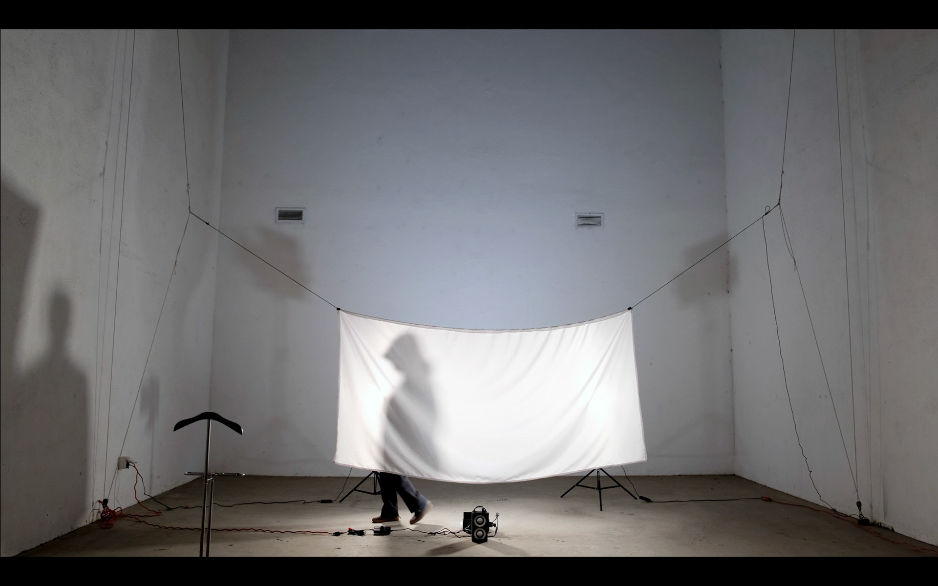Wandering Suit, 2022, textile, video, lighting, dimensions variable