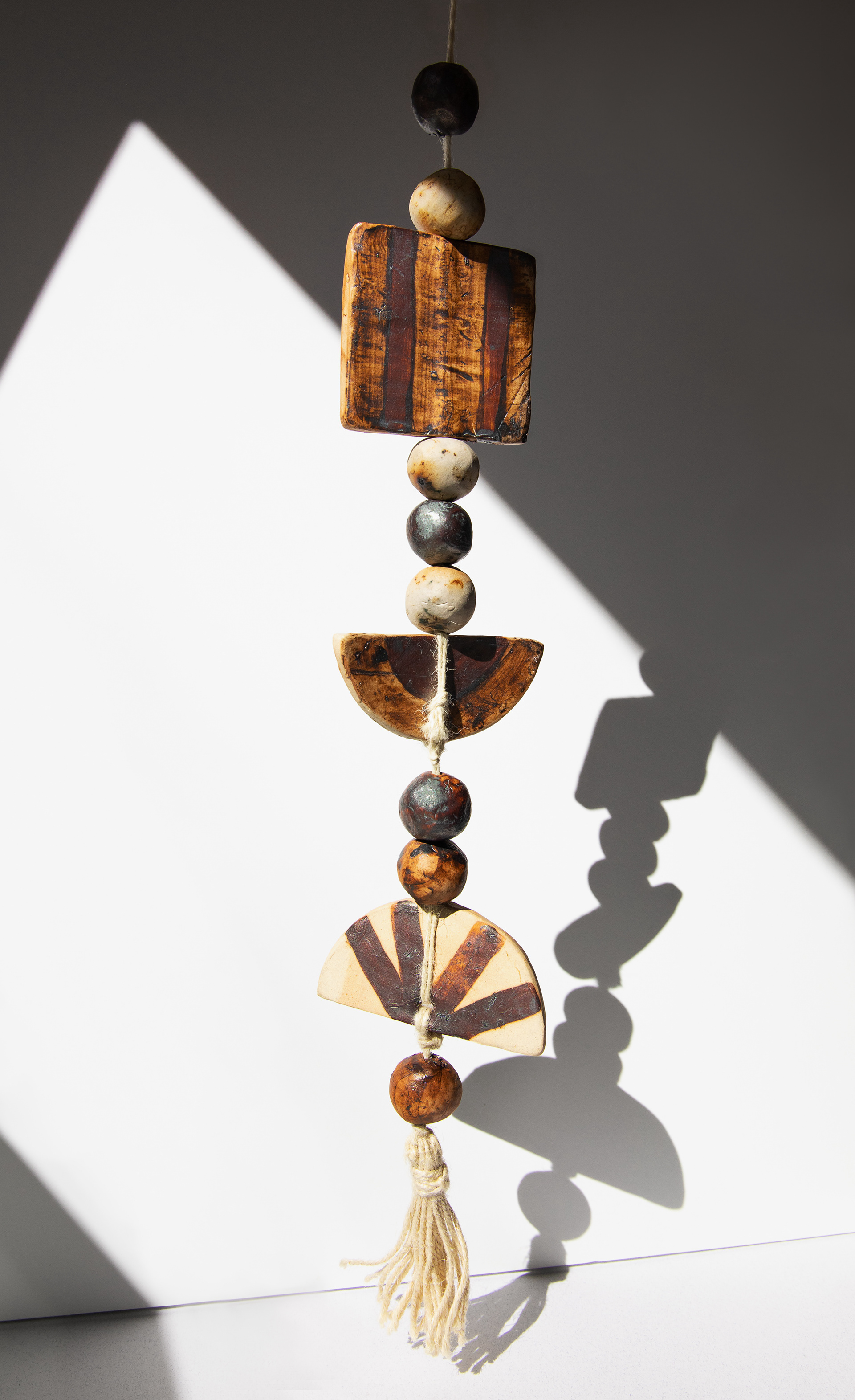 Untitled, 2024, earthenware and iron oxide, dimensions variable