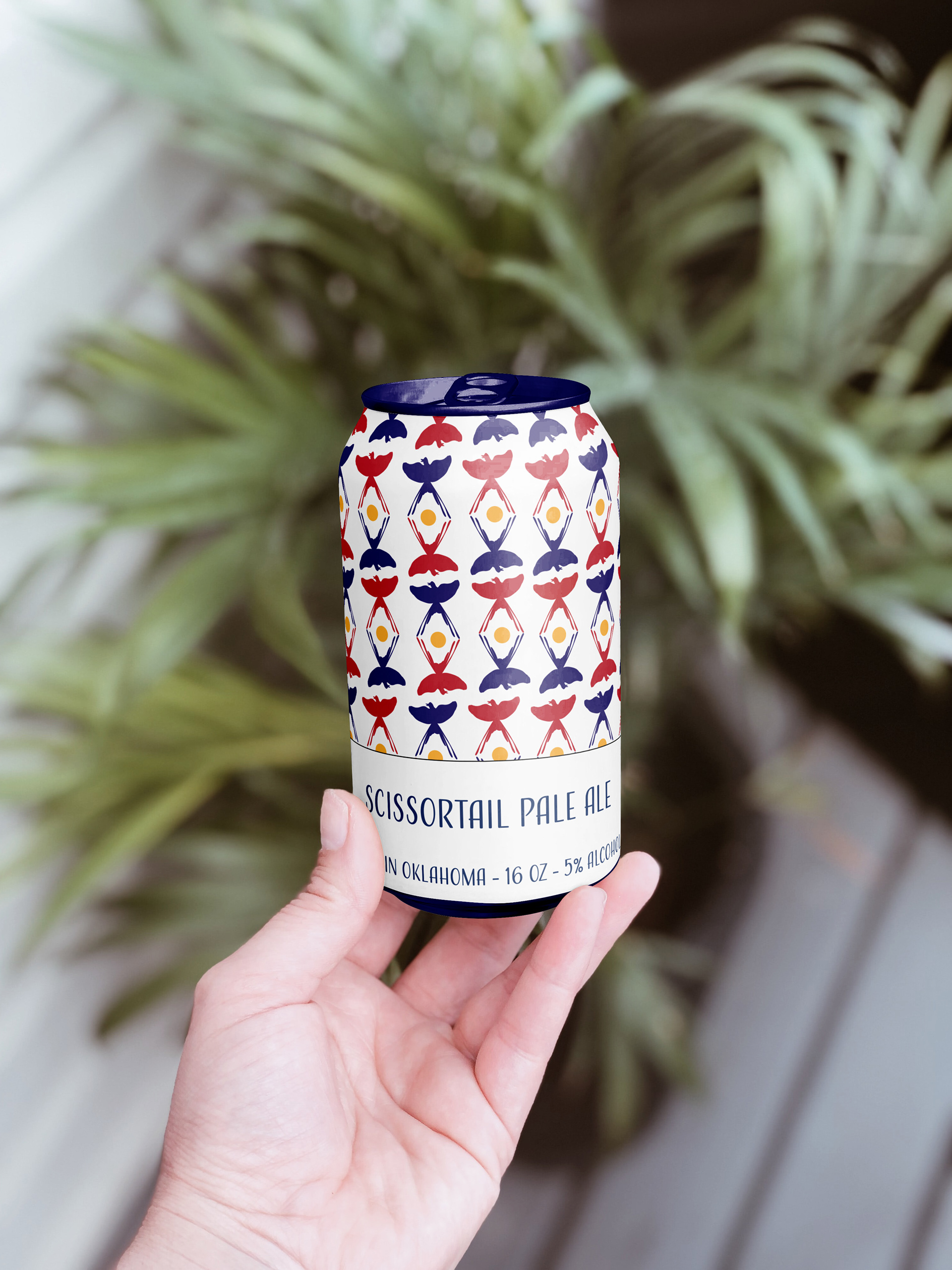 Pattern design using a pattern containing a single-shape illustration. This can of "Scissortail Ale" is meant to represent Oklahoma with the scissortale pattern and yellow sun design. I also added a blue top to add a little delight. 