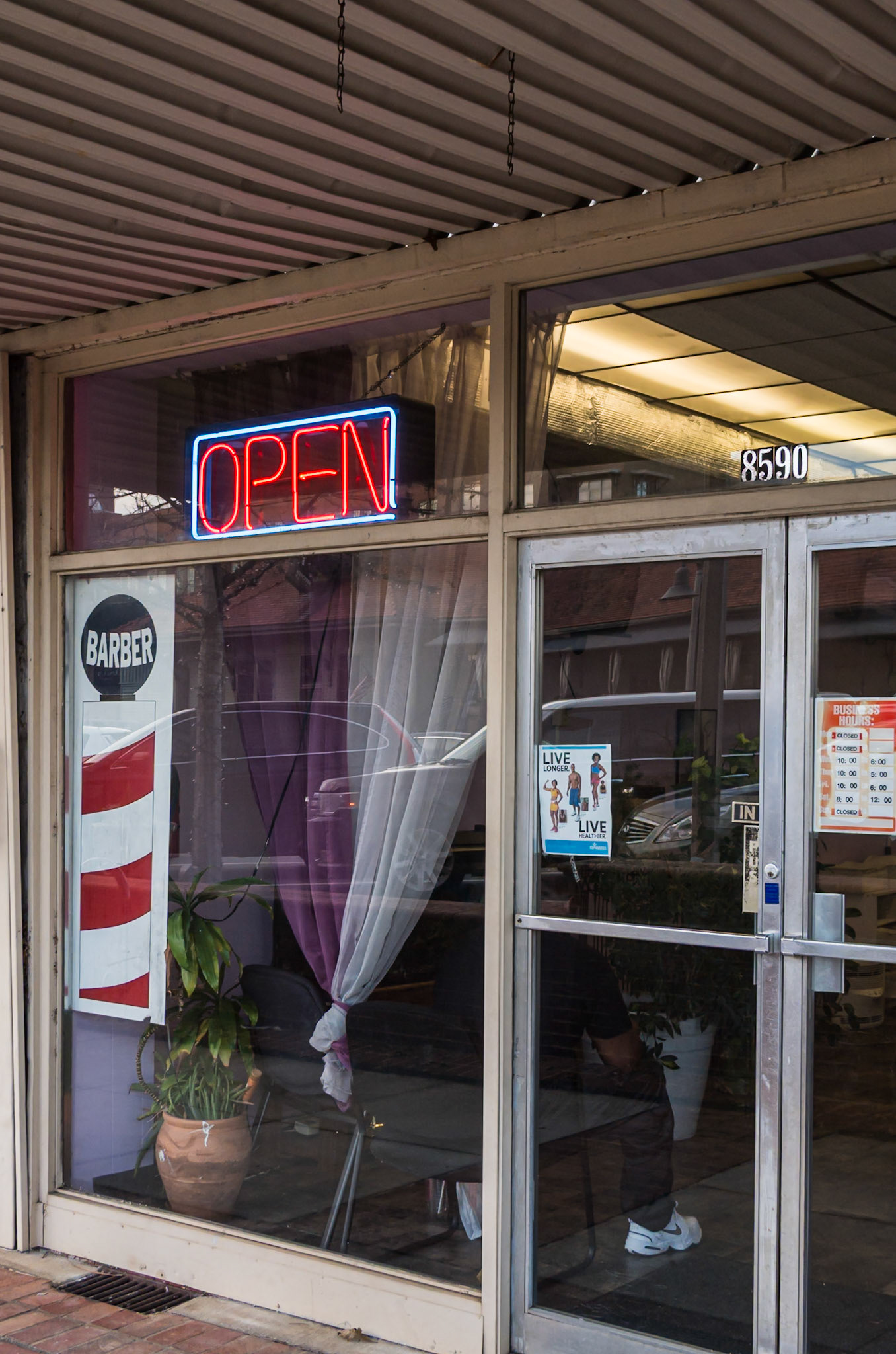 A barber shop storefront in downtown Woodstock in January 2016
