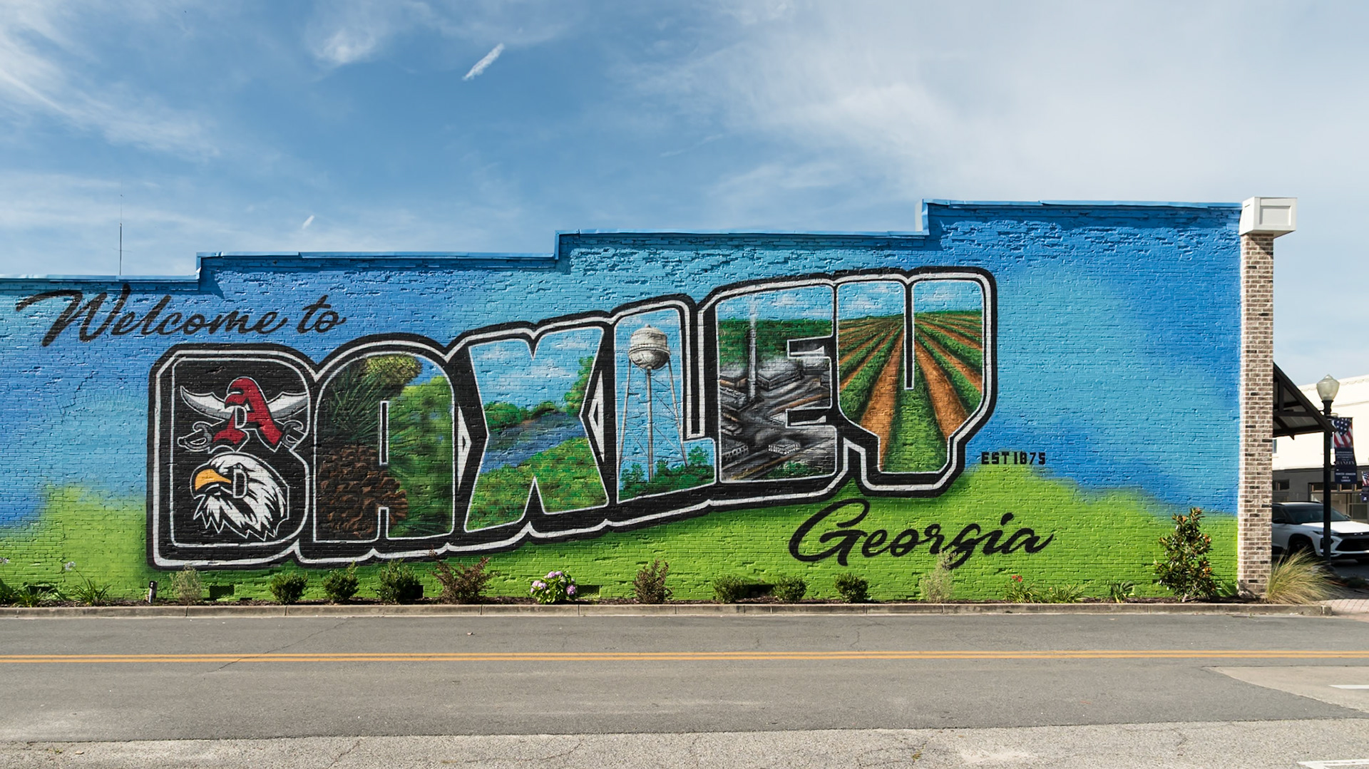 “Welcome to Baxley, Georgia” mural on a downtown commercial building,in June 2024