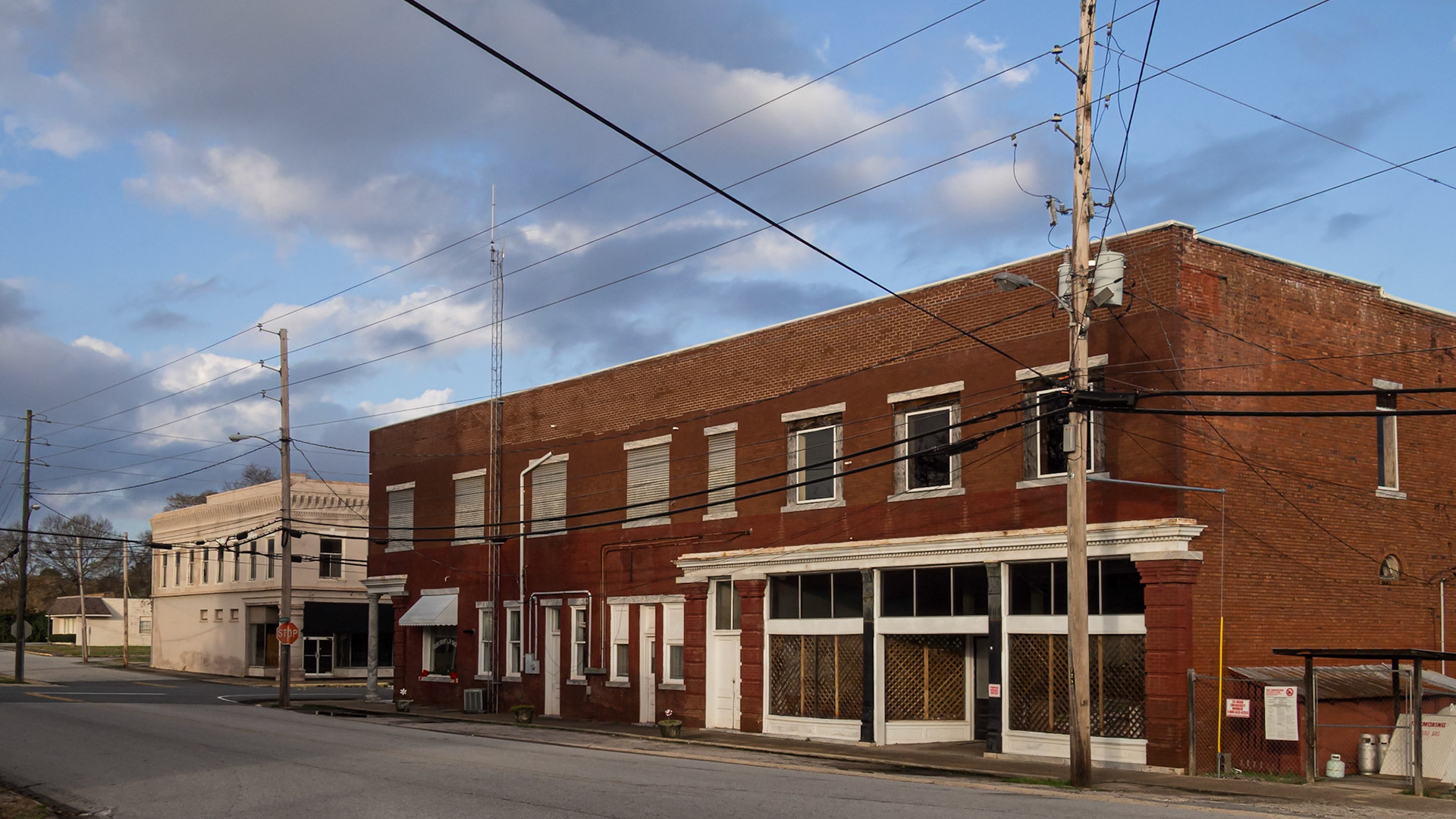 Historic commercial buildings along a street in downtown Woodbury, Georgia, in December 2015