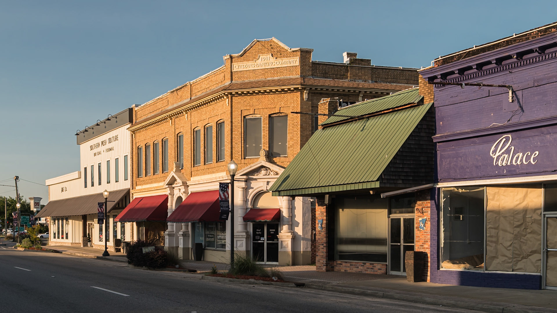 The 1911 Citizens Banking Company building and adjoining storefronts in downtown Baxley, in June 2024