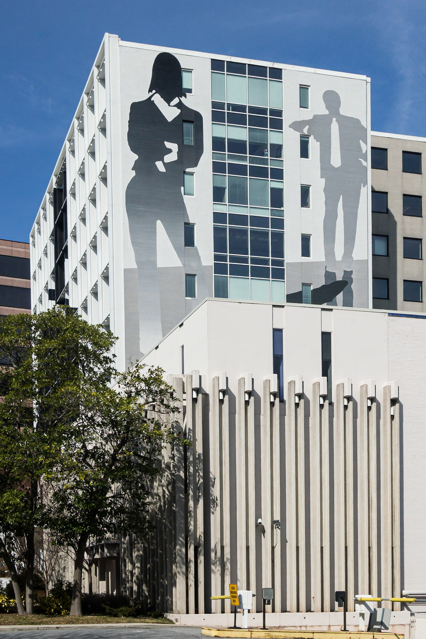 Signs, storefronts, and street-level details along a Midtown Atlanta street in February 2014