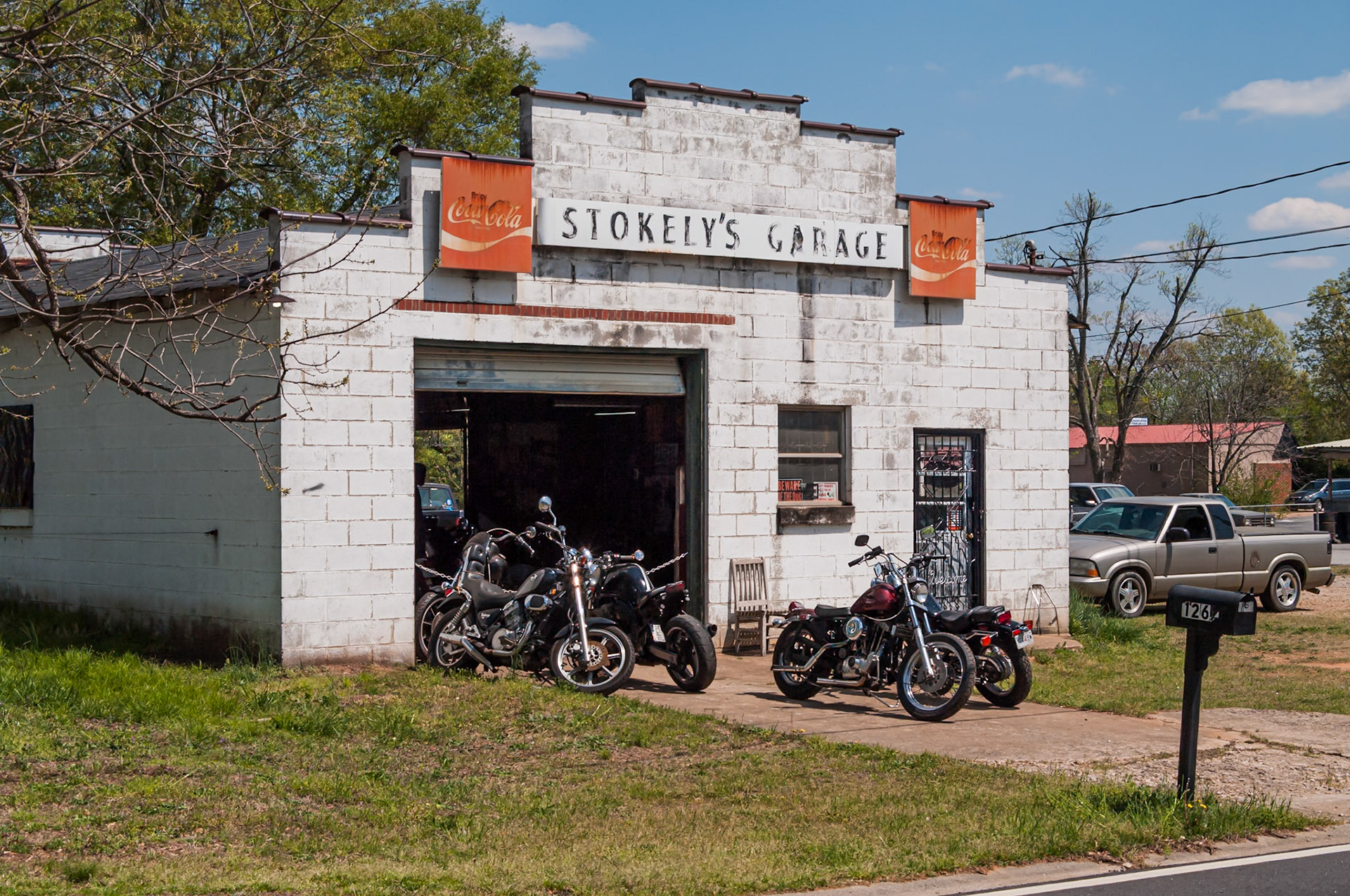 Stokely’s Garage with motorcycles parked outside in Crawford, Georgia, photographed in April 2014