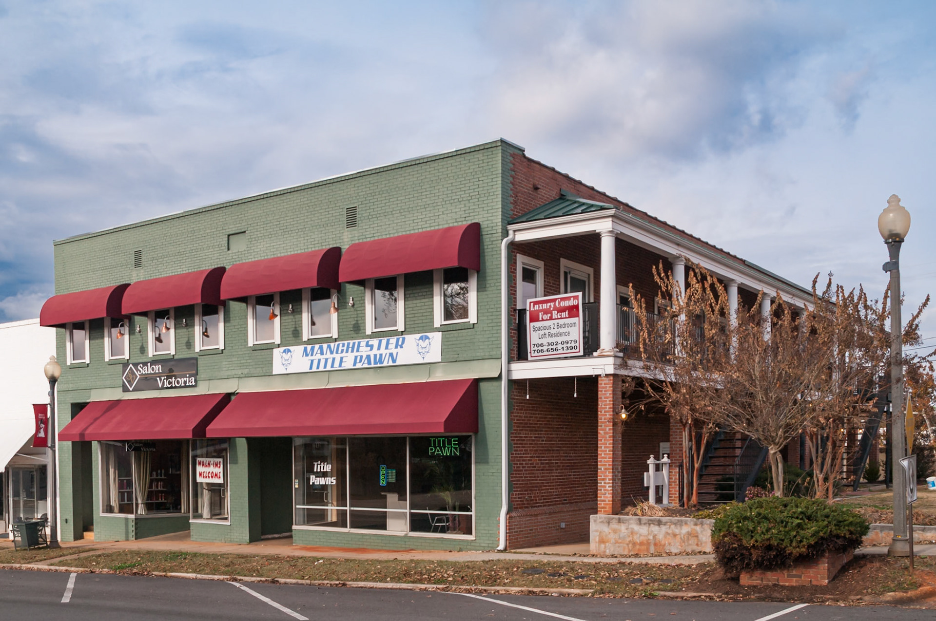 Manchester Title Pawn and adjoining commercial building in downtown Manchester, Georgia, photographed in November 2013