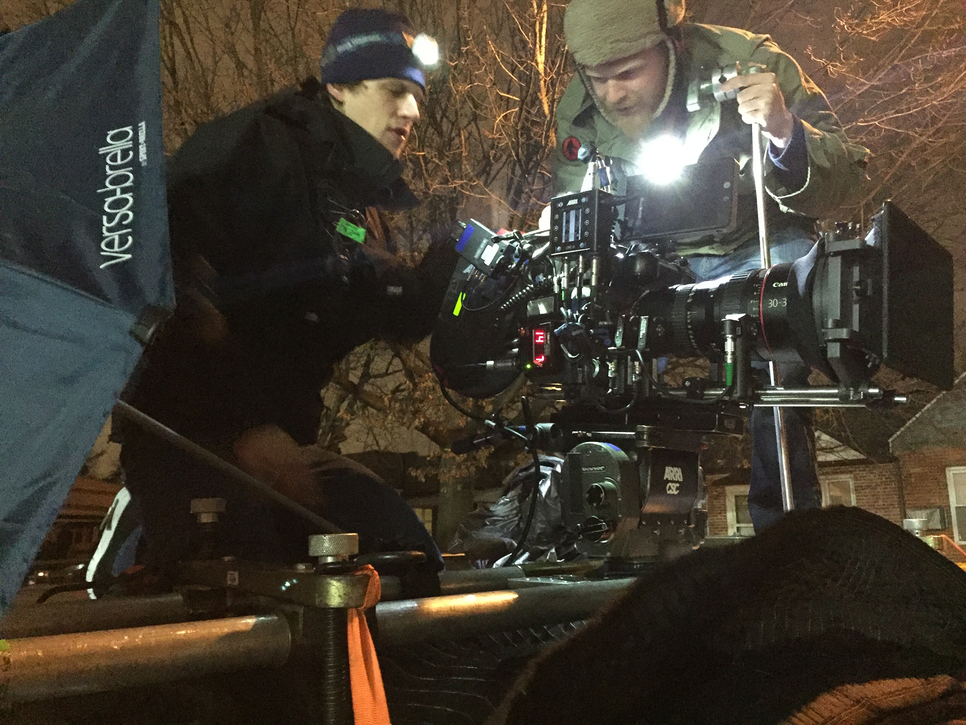 Bayley setting up a camera rig with Key Grip Sean Gradwell