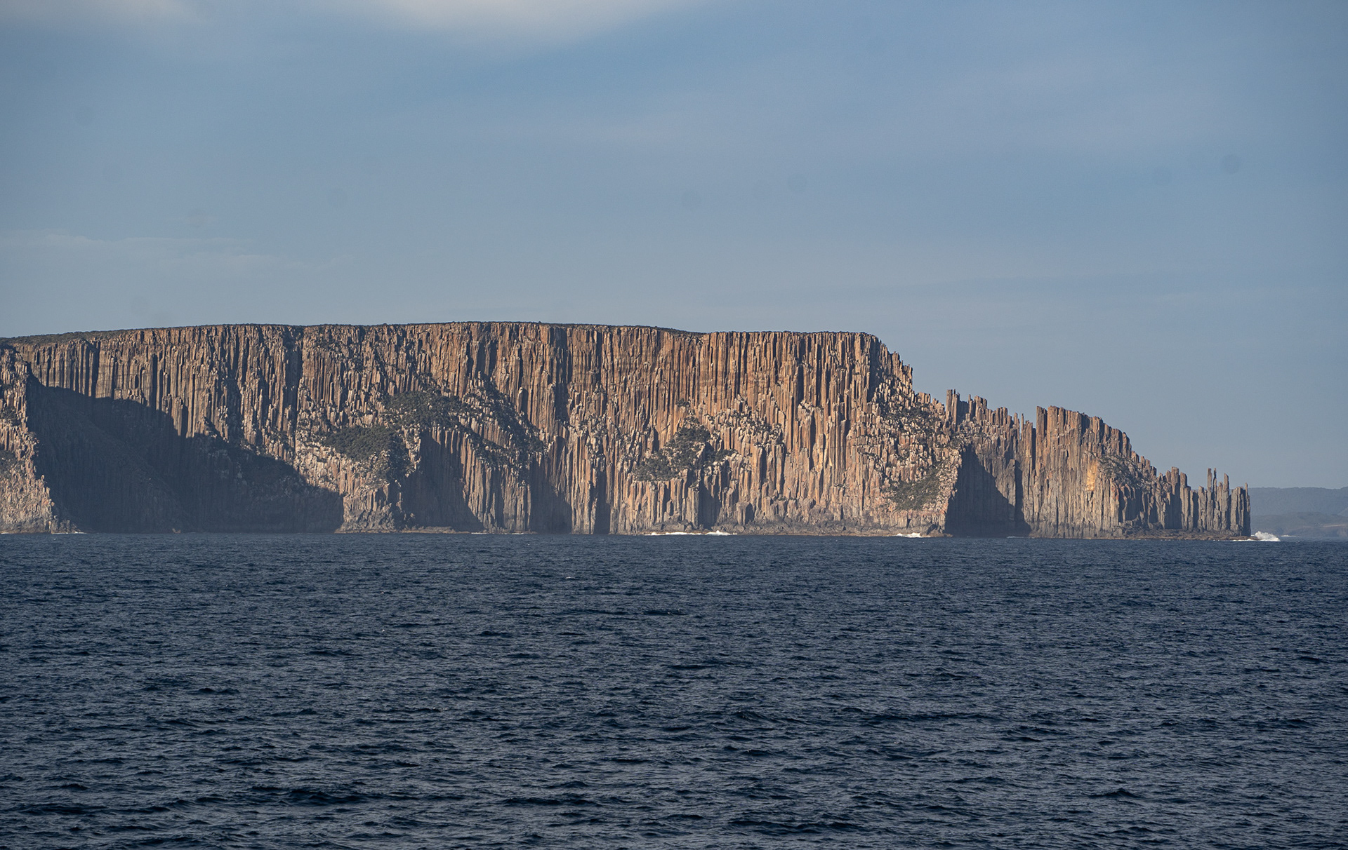 View of Tasmania as cruise ship heads out to Tasman Sea
