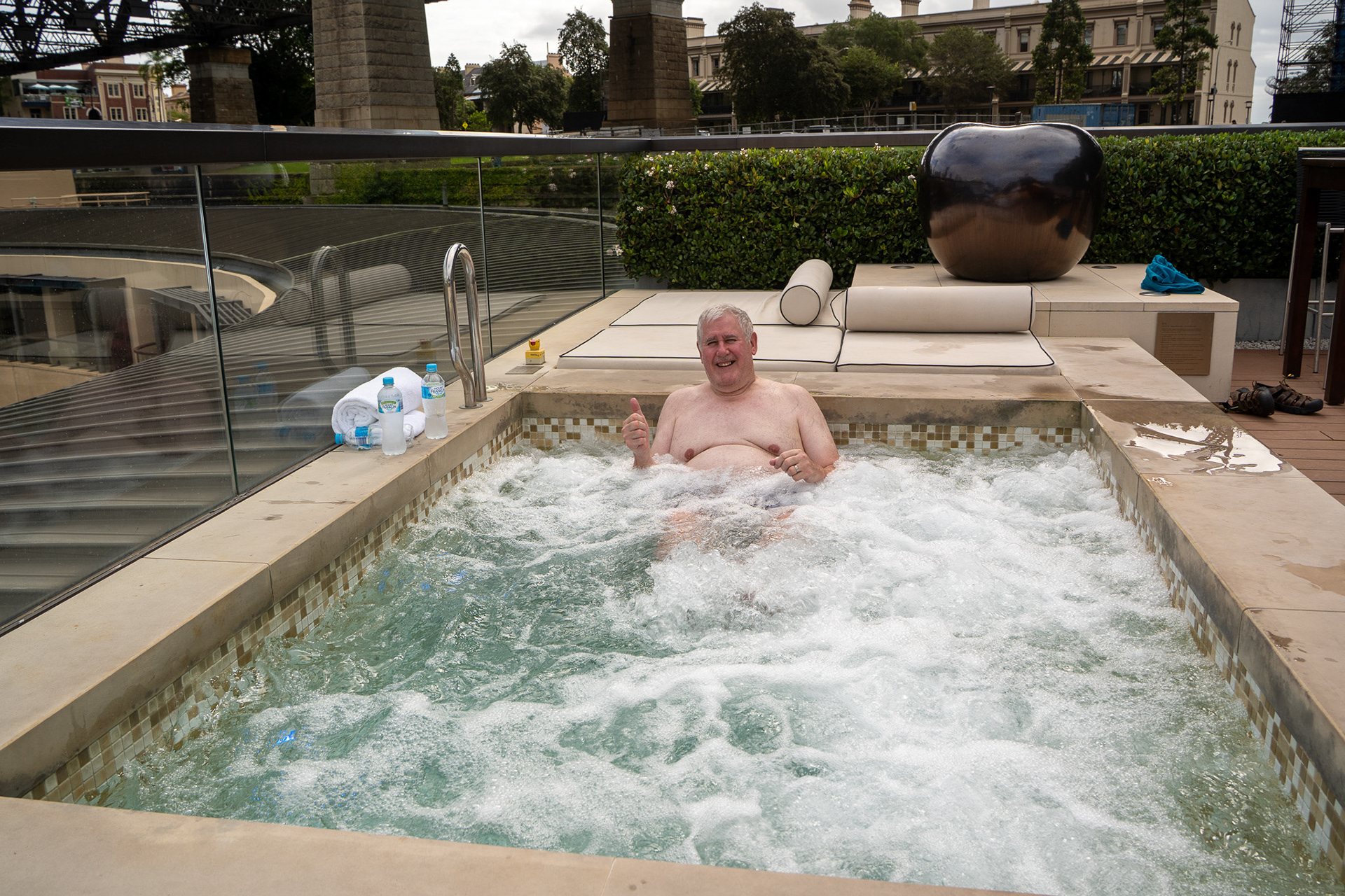 Joe in hot tub on roof of Park Hyatt