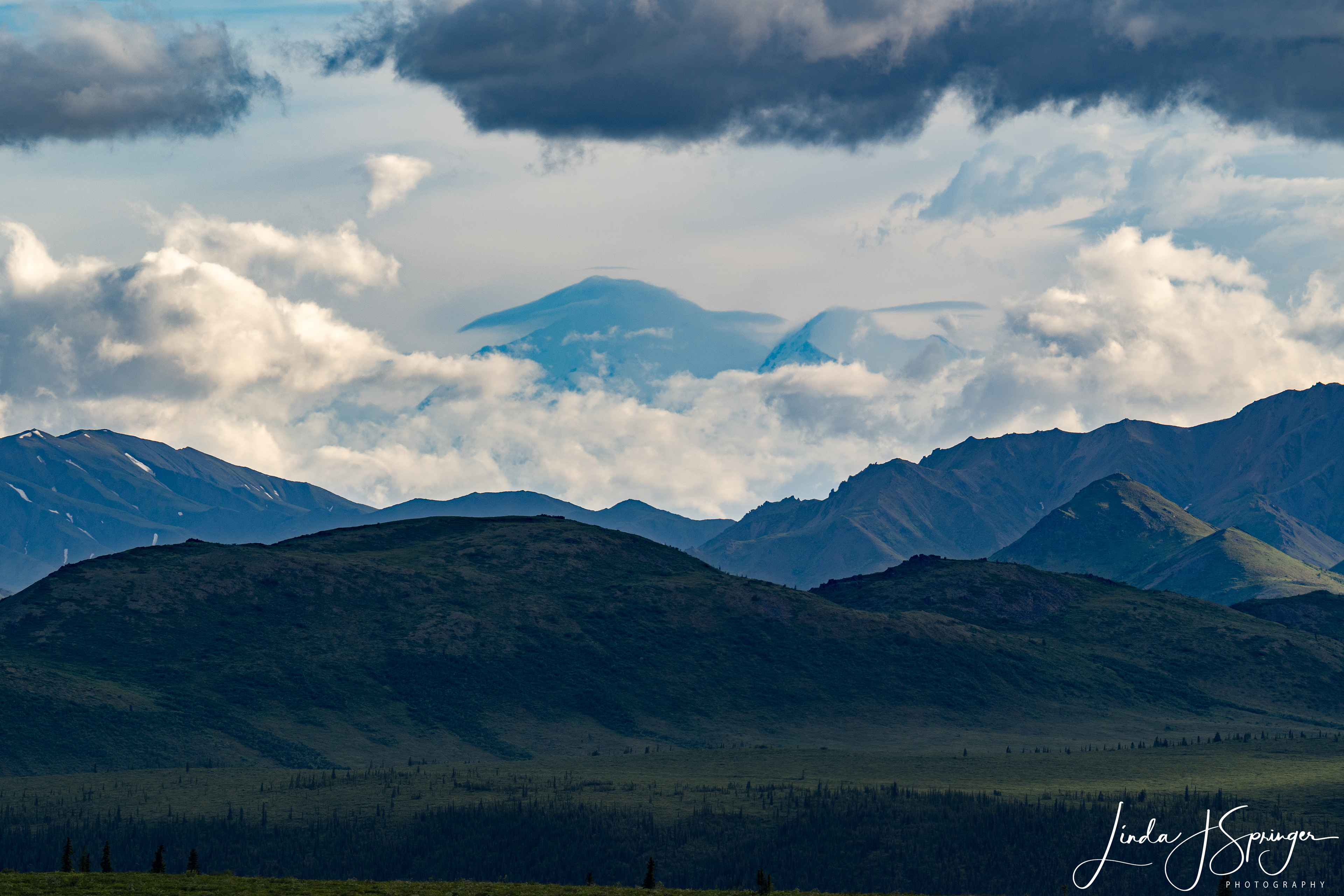 Mt. McKinley peaking through the clouds