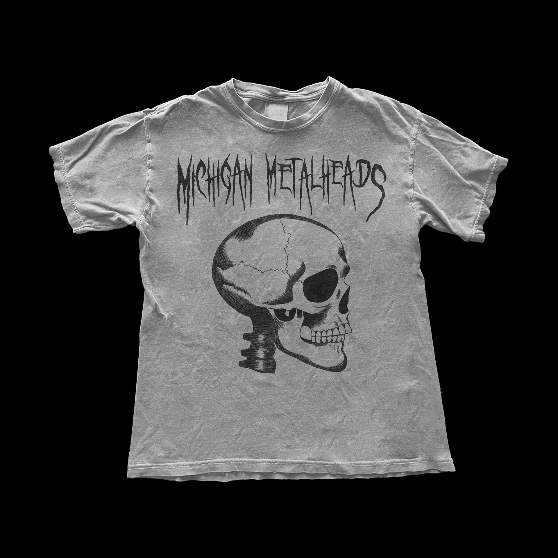 a shirt with the logotype and skull drawing on it