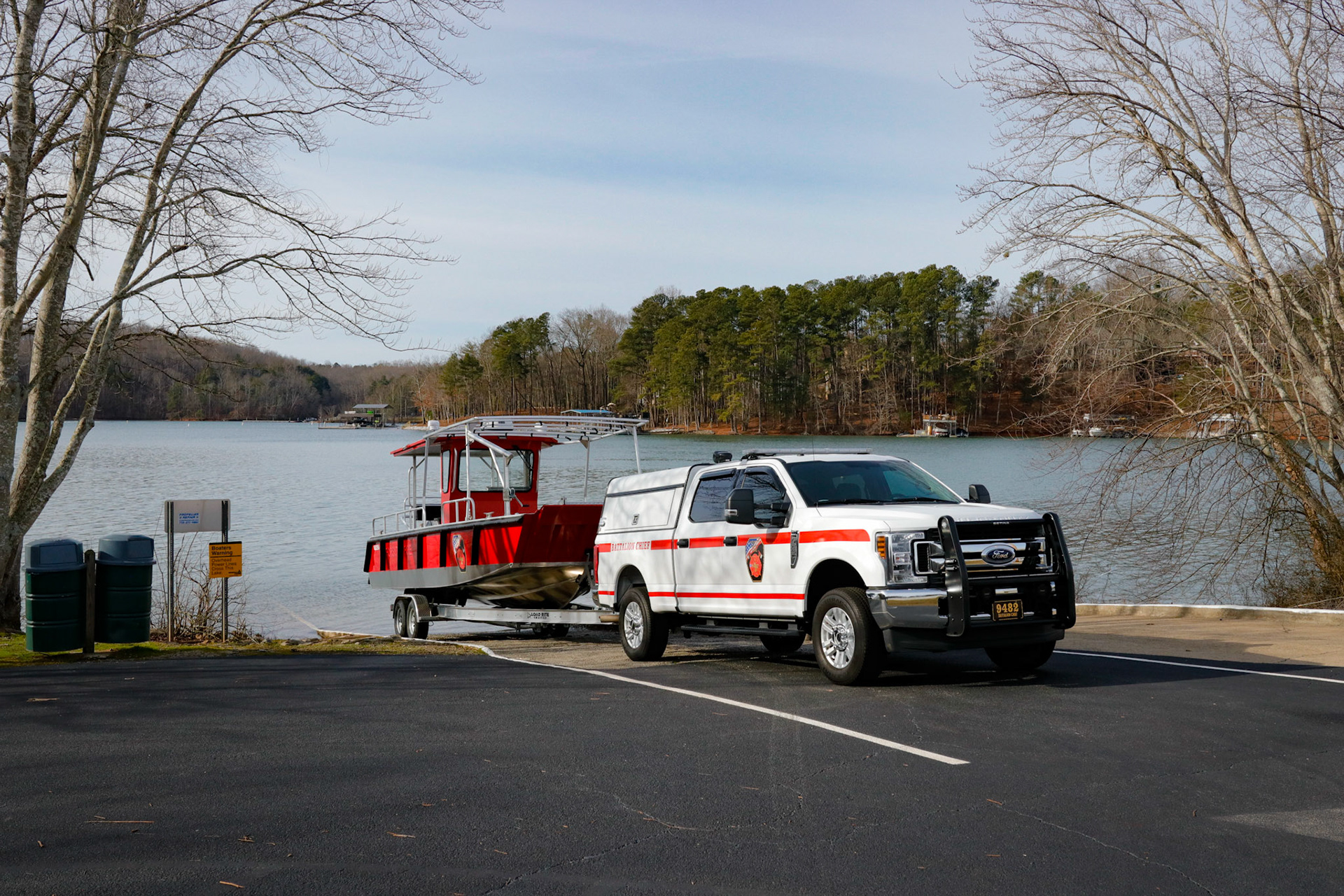 Fire chief backs new dive boat into the lake
