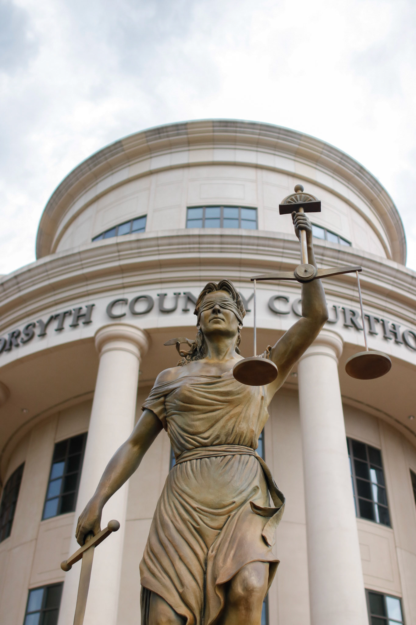 Lady Justice in front of the Forsyth County Courthouse