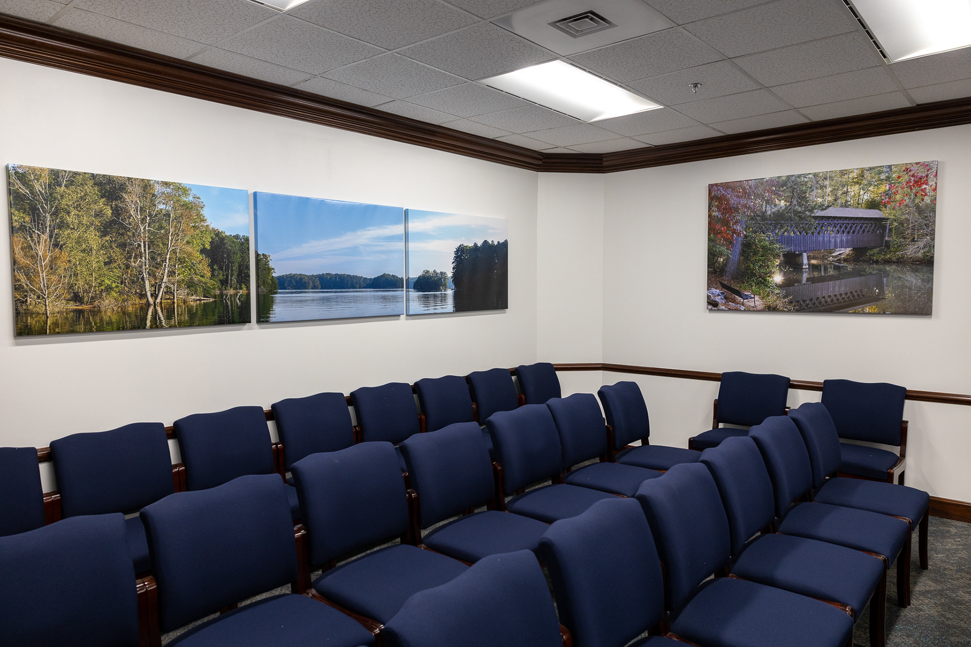 Photos on display on canvas wraps in Forsyth County Board of Commissioners' Suite
