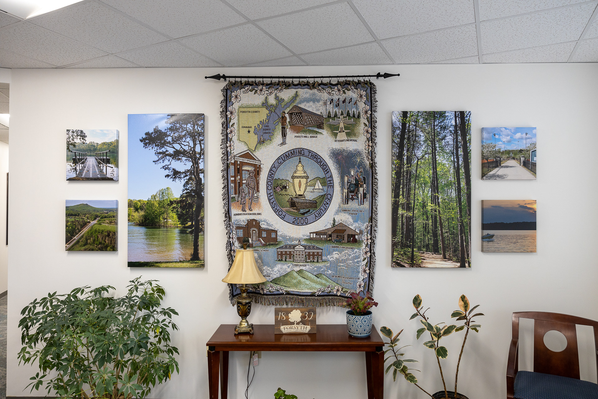 Photos on display on canvas wraps in Forsyth County Board of Commissioners' Suite