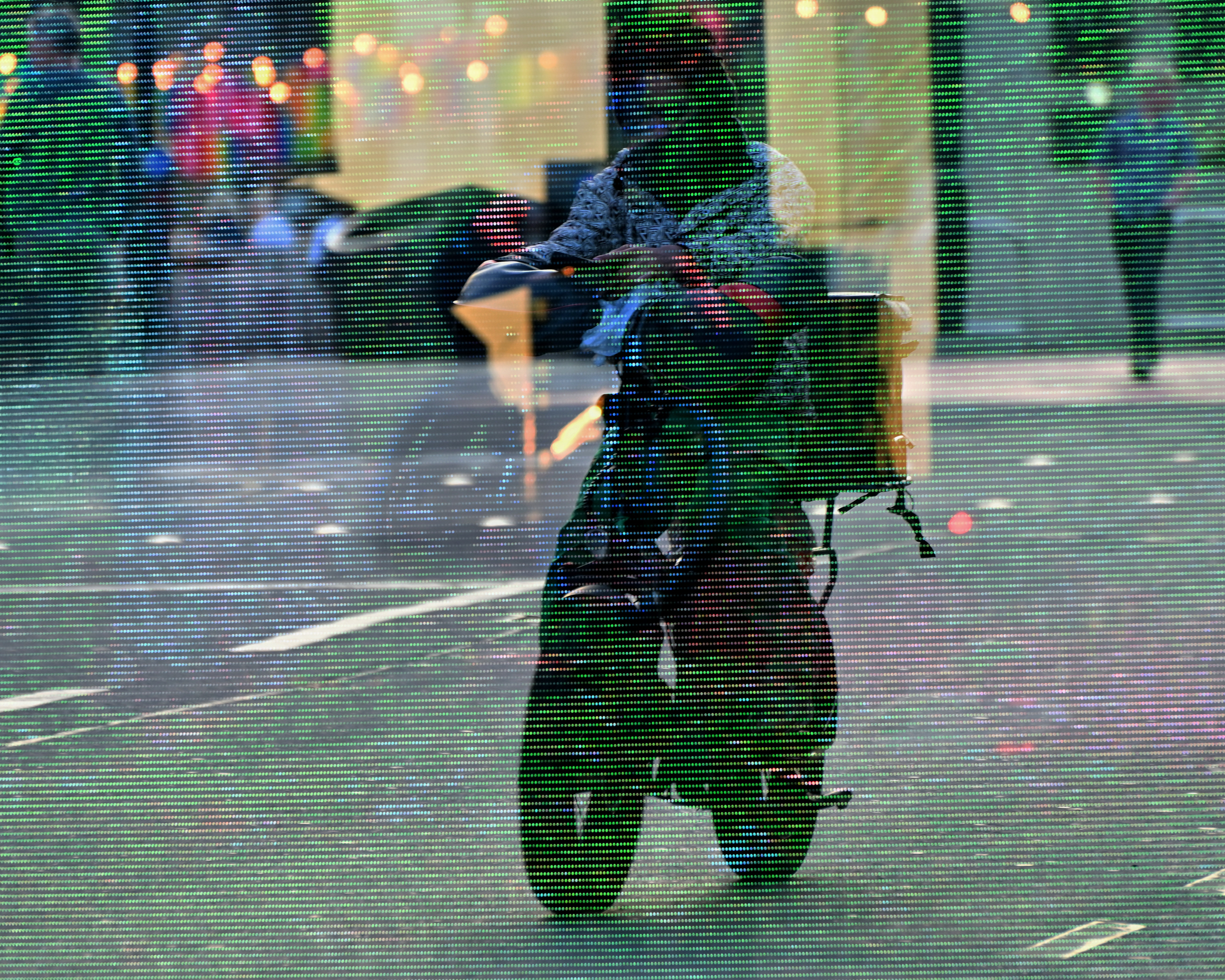 Double-exposure: bike + digital bike advert, Leeds