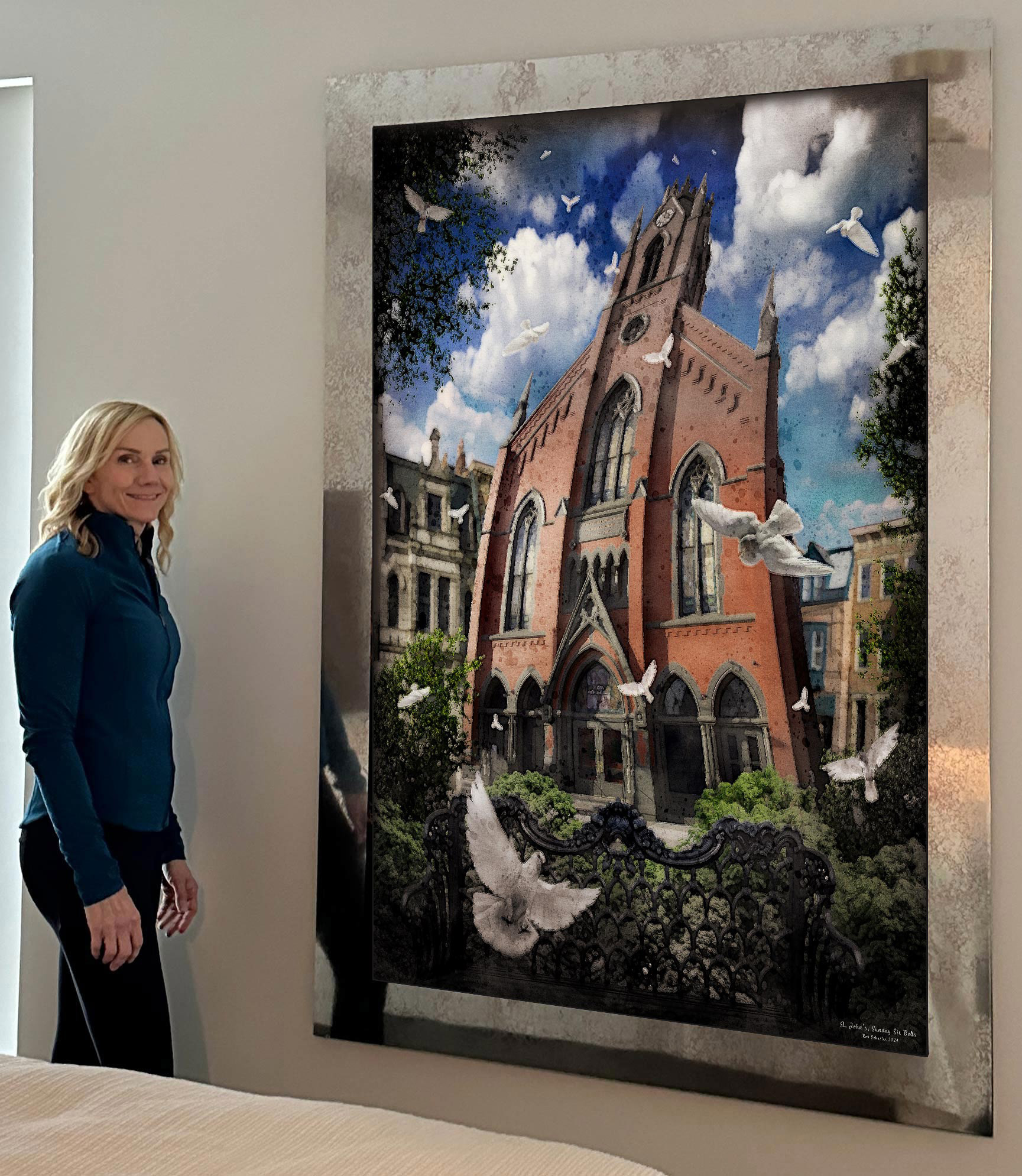 Carol after hanging "St. Johns Sunday Six Bells" printed on mirrored metal (OTR Cincinnati).
