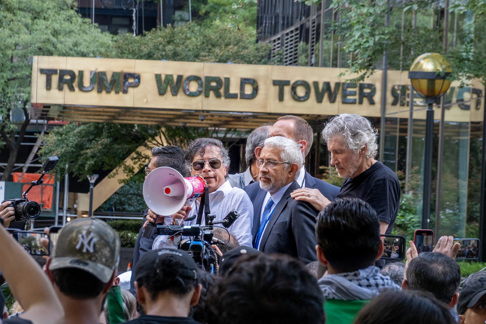 Colombian President Gustavo Petro addresses pro-Palestinian demonstrators, through a translator, accompanied by musician Roger Waters, at Dag Hammerskjold Plaza. One day later, his visa got revoked.