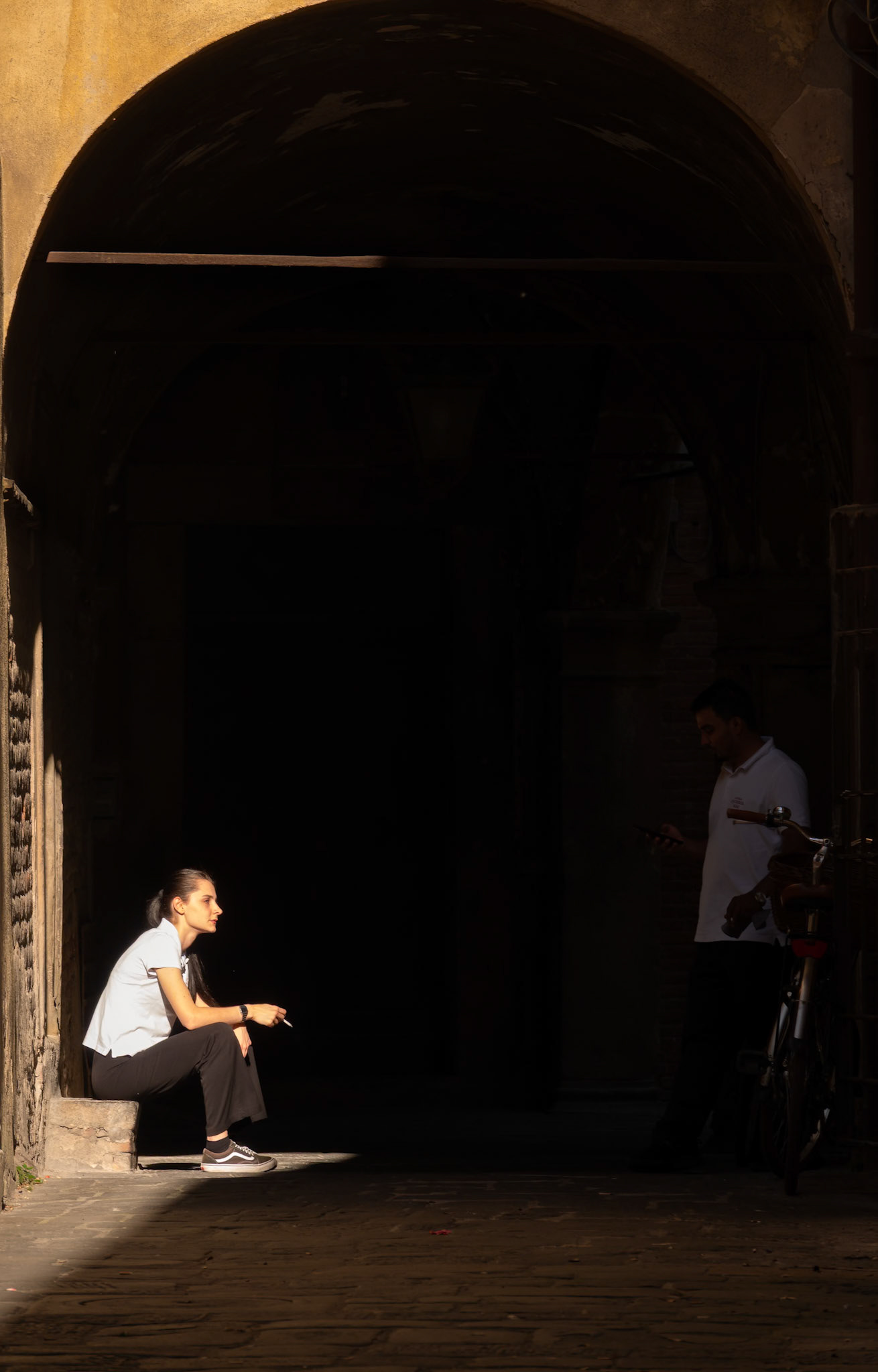 Cigarette break in Lucca, Italy