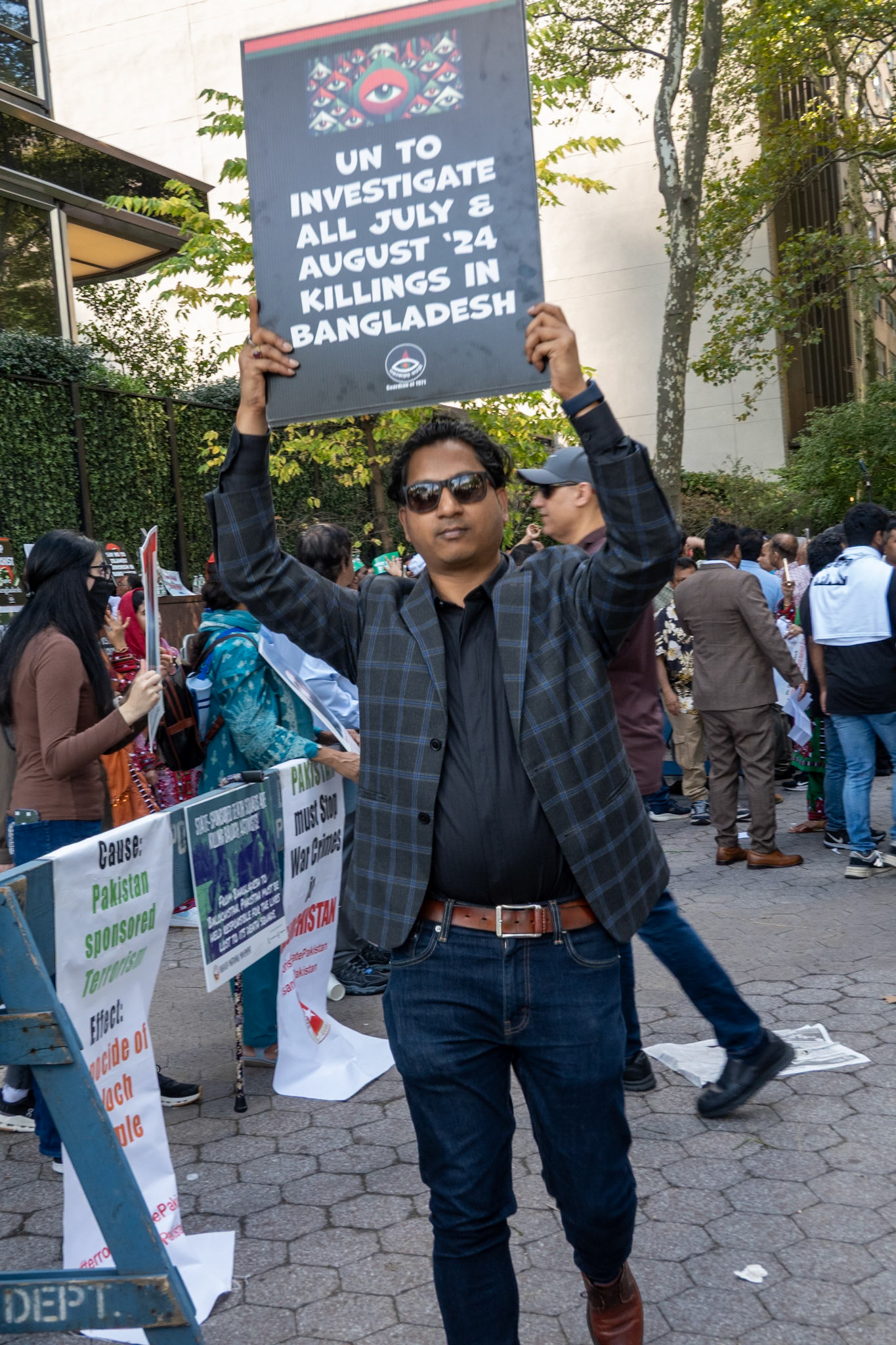 Protester from Bangladesh, criticizing interim leader, Muhammad Yunus over a rise in atrocities against minorities in Bangladesh