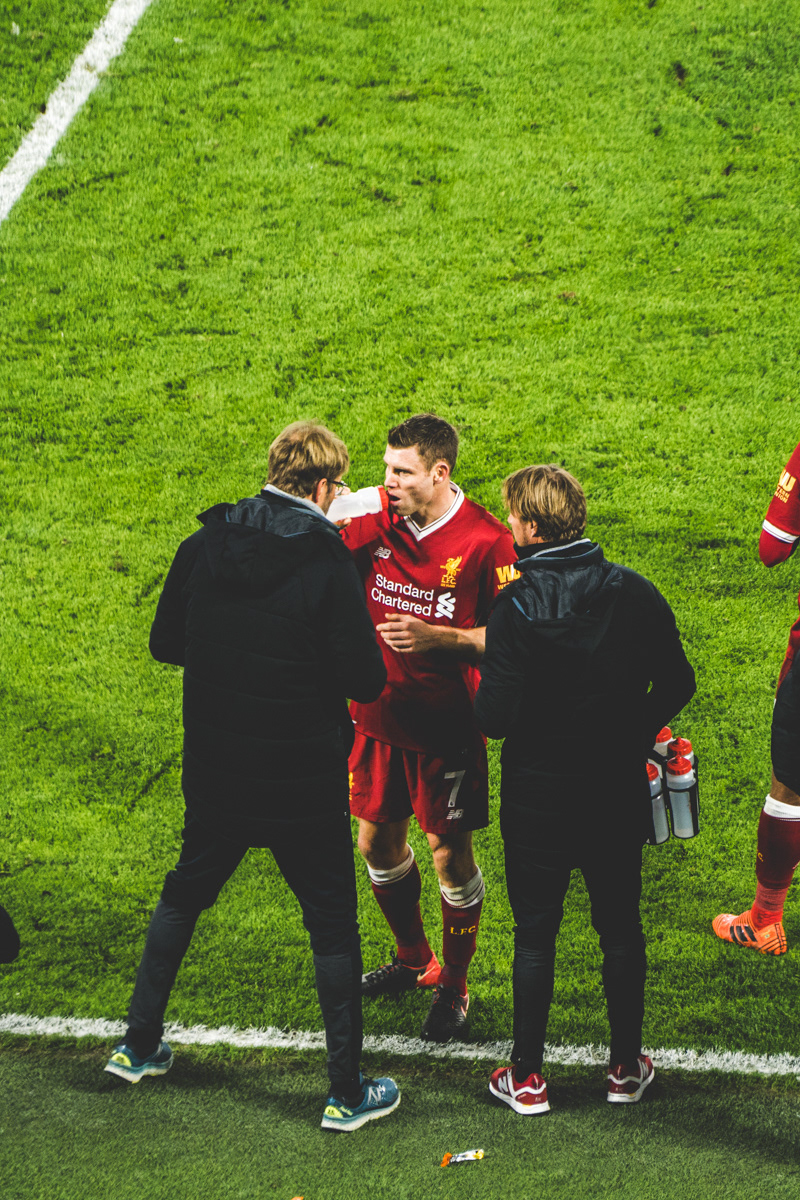 Jurgen Klopp gives James Milner instructions at The Amex