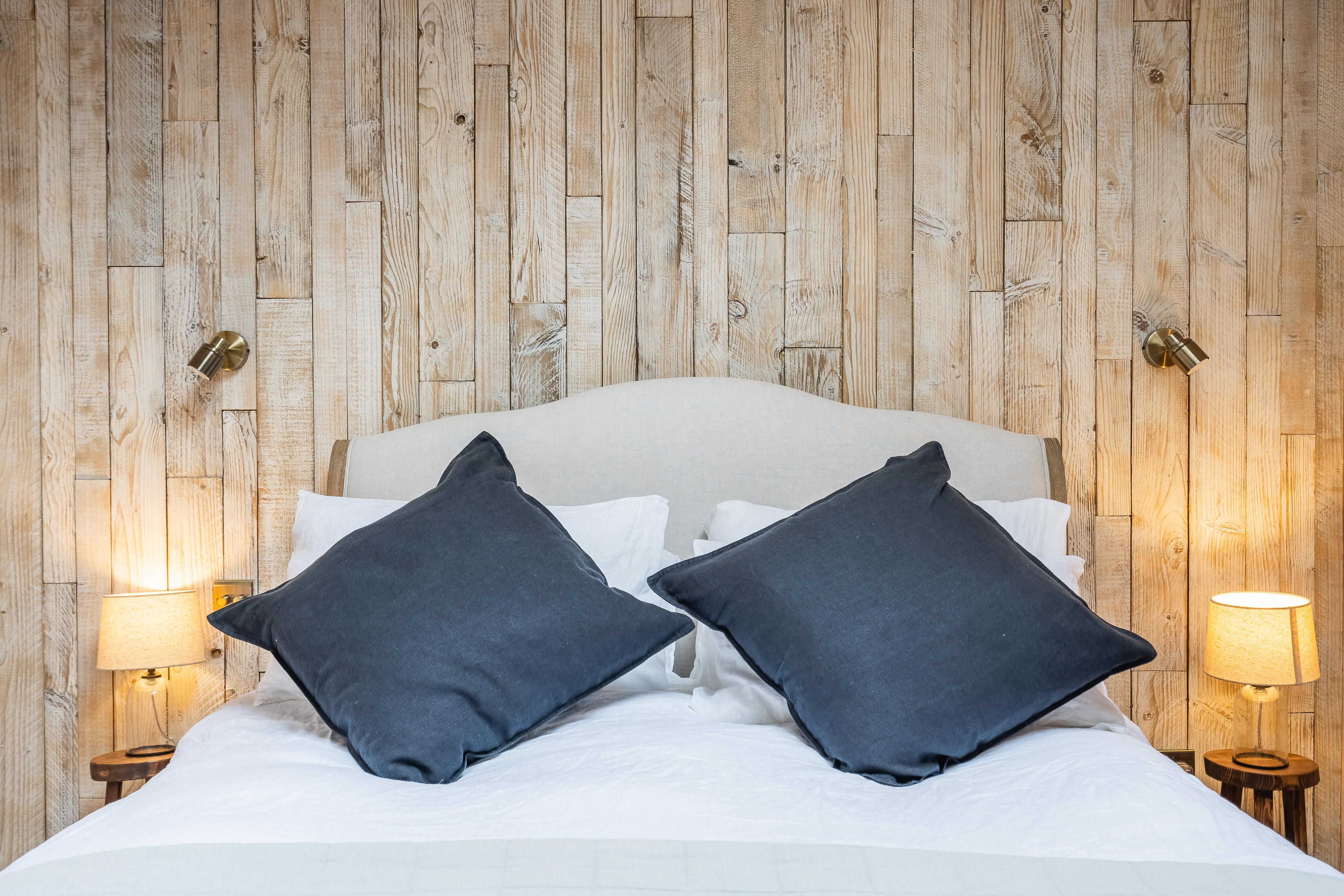 Cosy pillows on a bed of an AirBnB