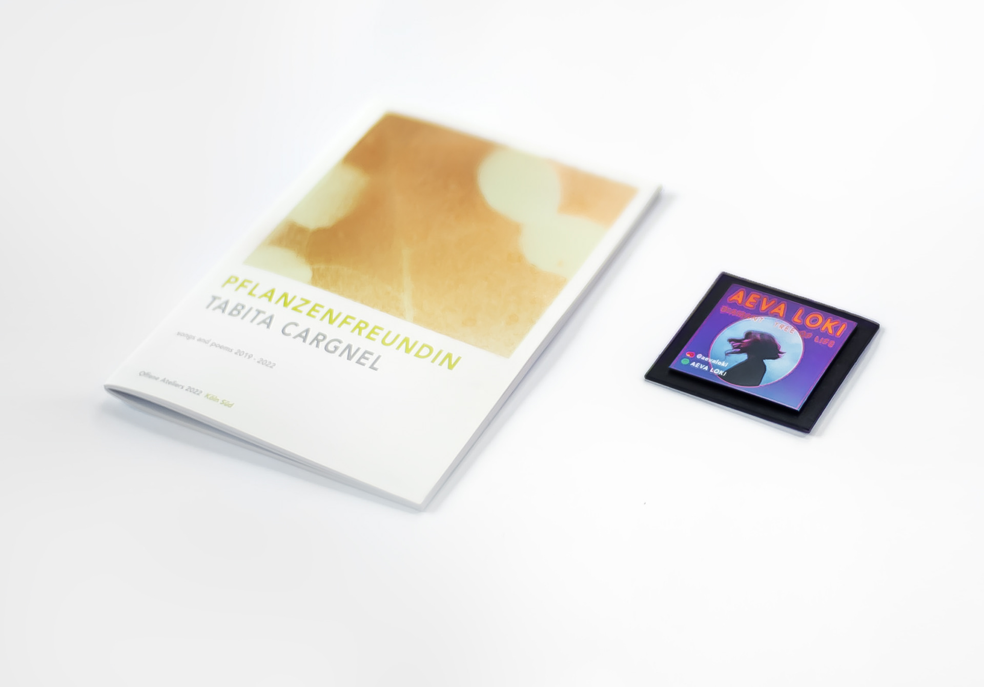 Poetry booklet 'Lunaria Honesty' and magnet on black cardboard