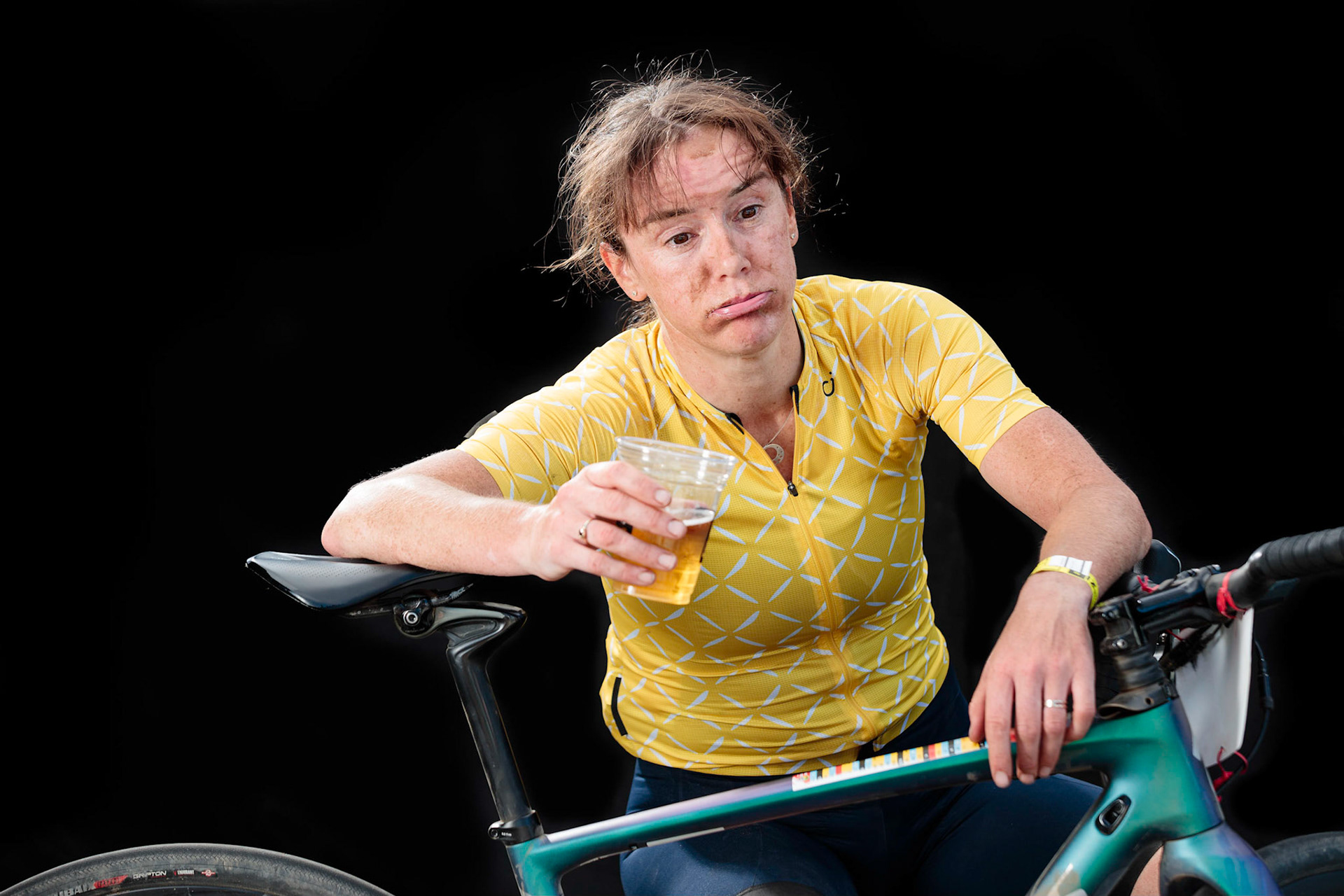 Olivia Dillon from Fairfax, CA enjoys a Lost Abbey brew within minutes of finishing 3rd place in the Belgian Waffle Ride.