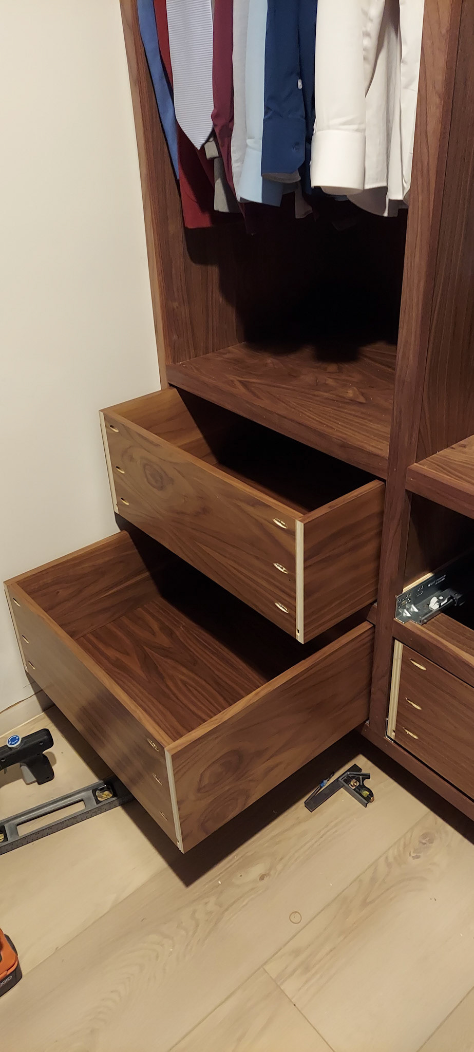 Cabinets installed, trimmed, drawers installed