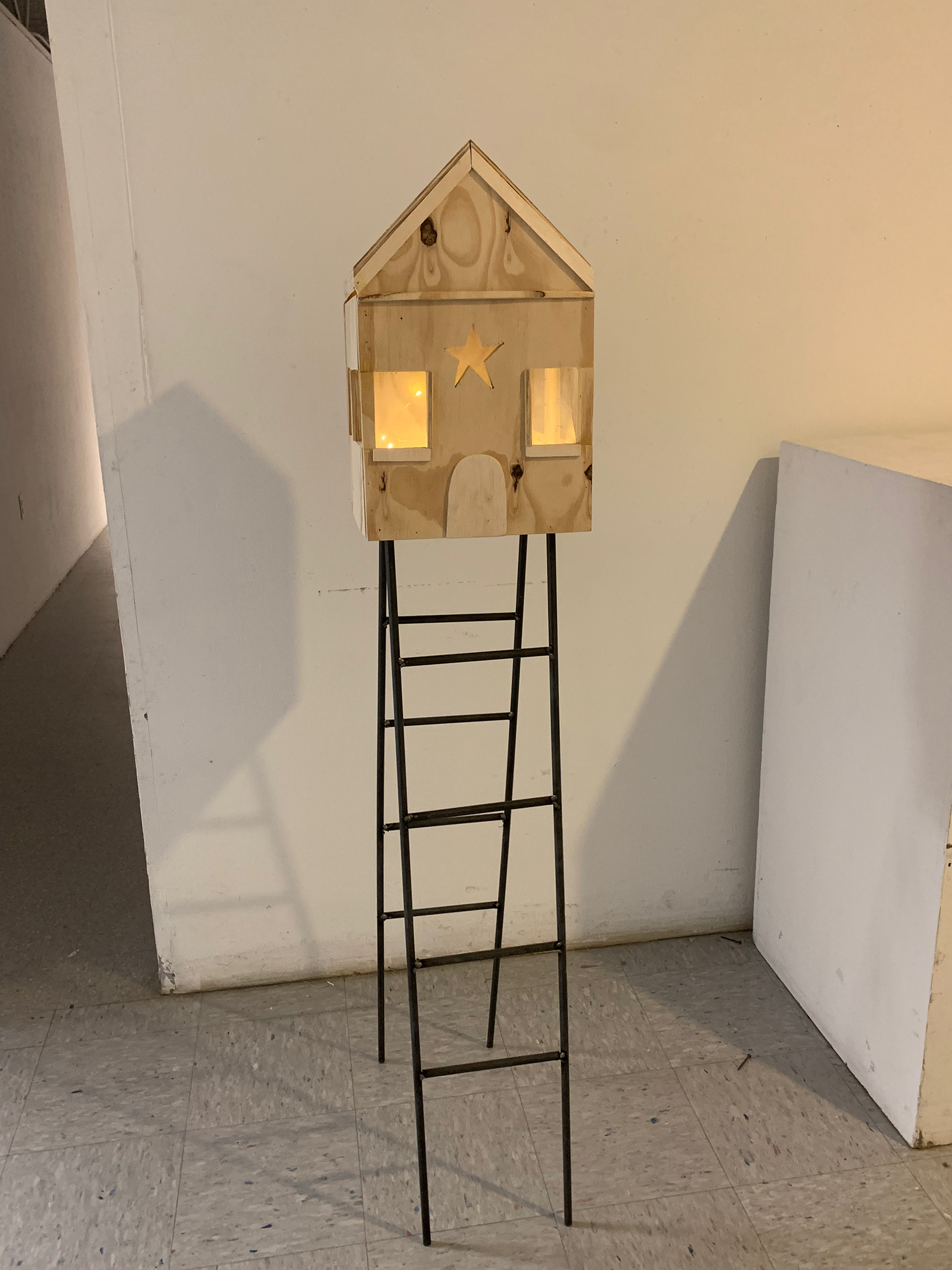 Materials: Wood, steel rods, battery powered lights