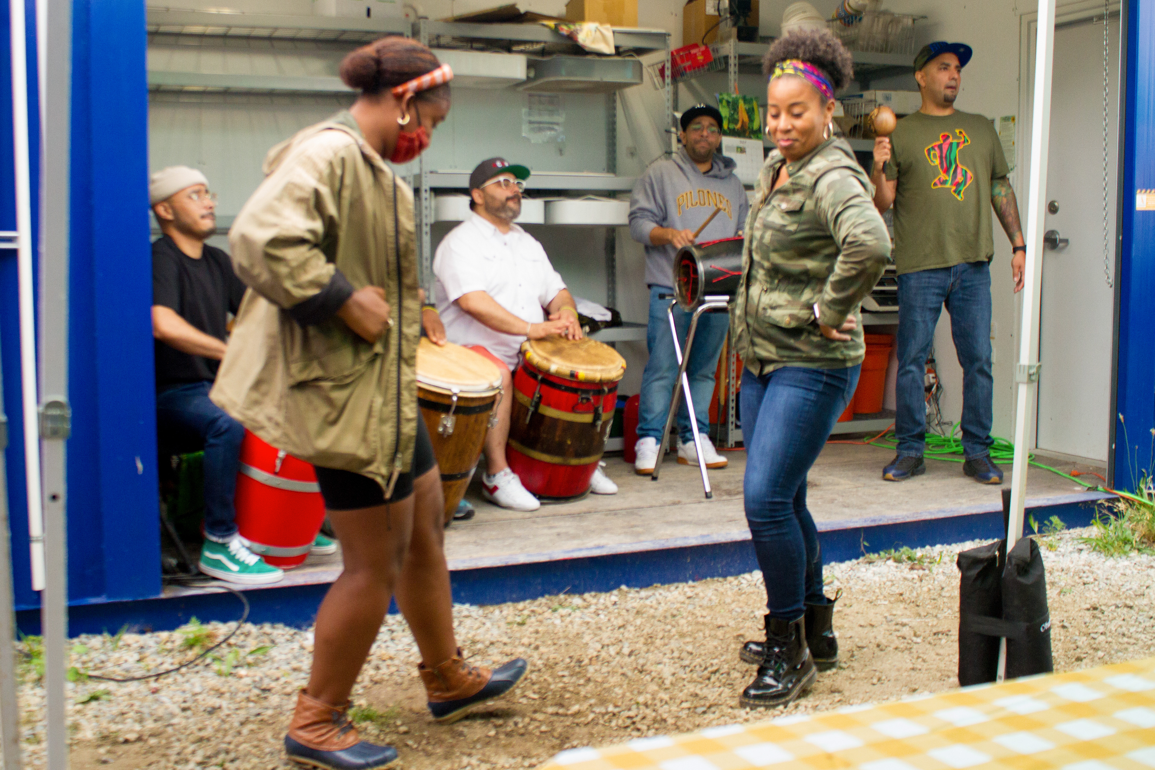 @bombaconbuya singer dancing with a member of the audience.