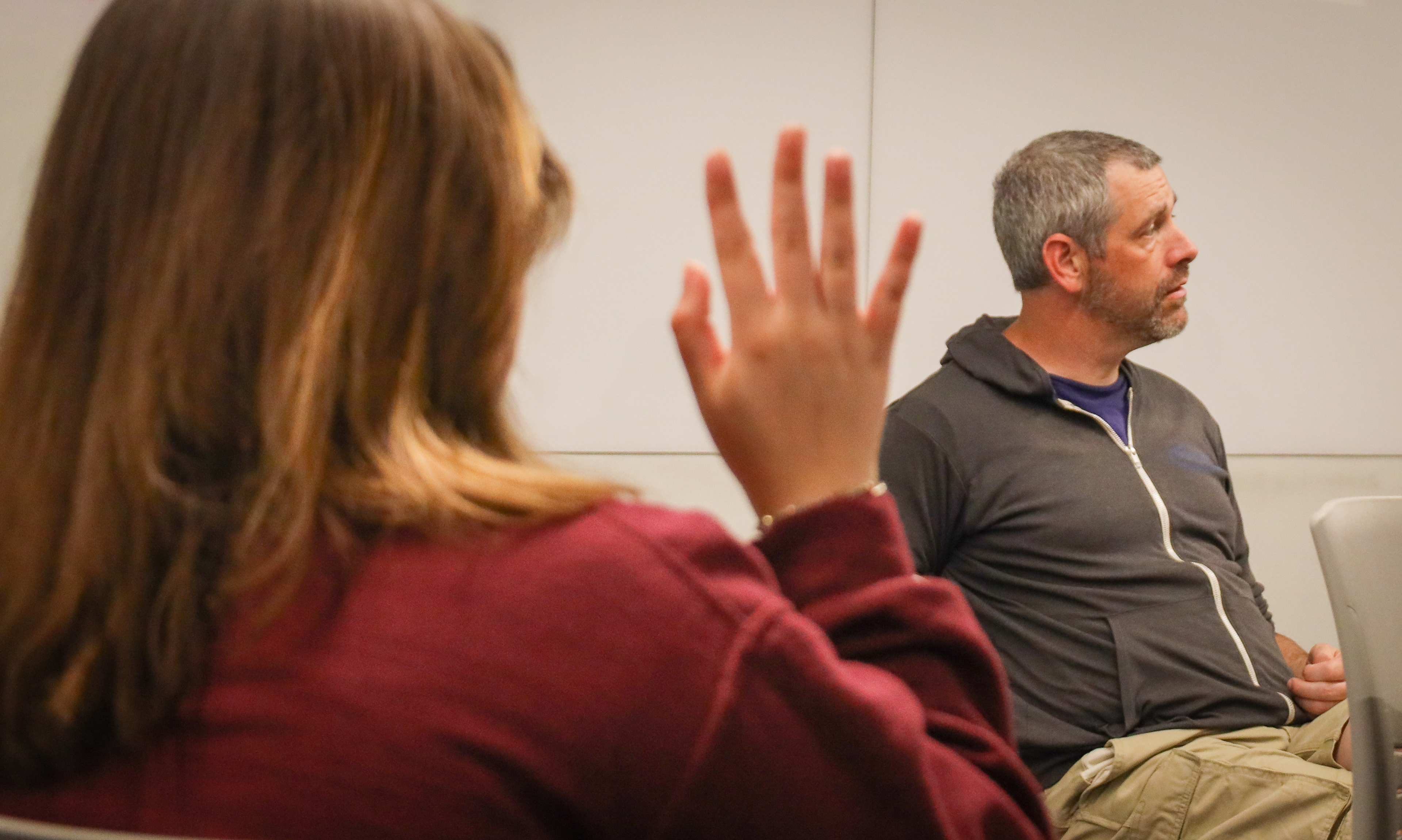 A student waits to ask Lyles a question in his class, Planning The Sustainable City, at the University of Kansas on April 25.