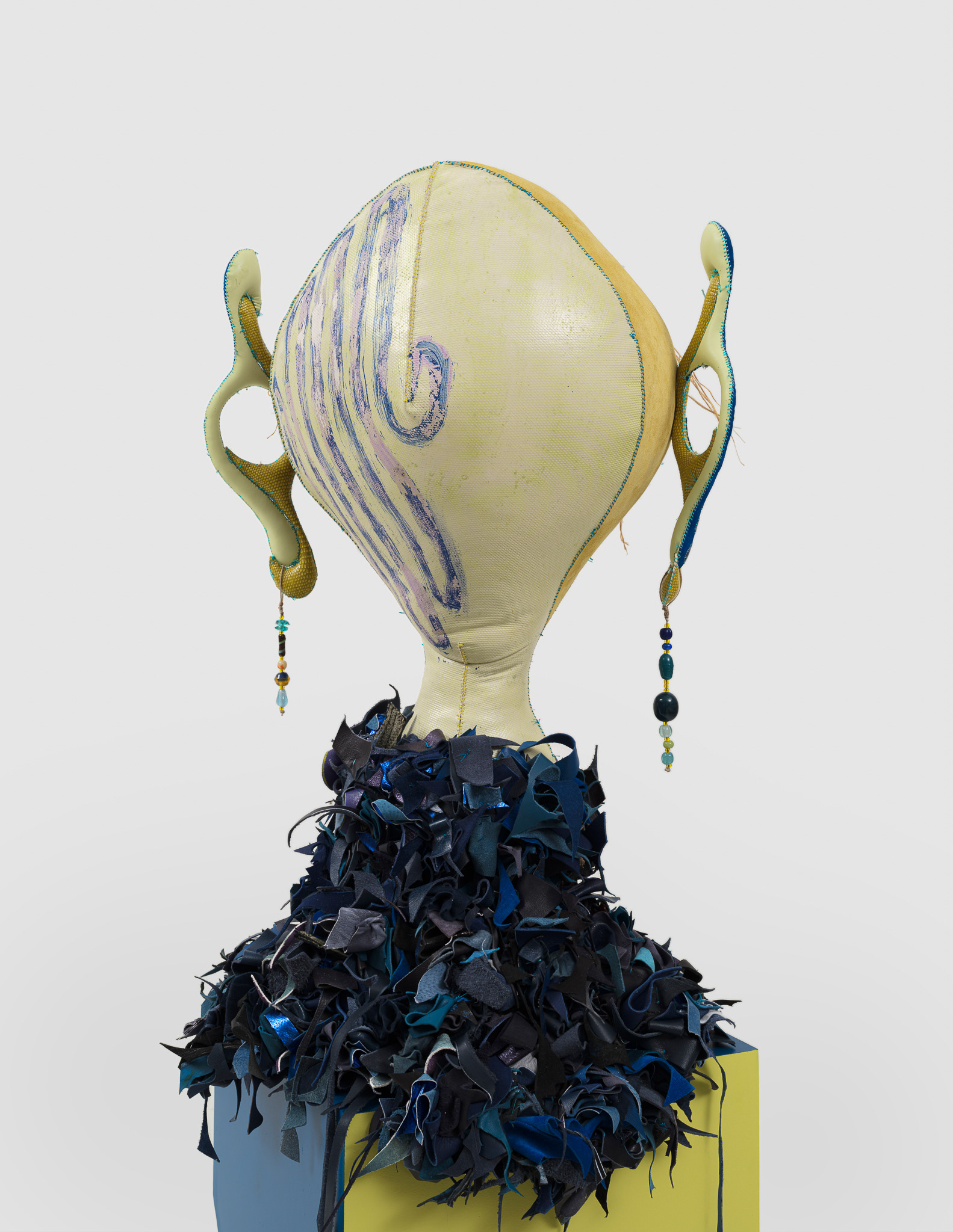 (detail) The Siren of Amazonis Planitia, 2023, Steel, wood, enamel paint, acrylic paint, leather dye and finisher, repurposed leather and suede, stones, ox bone beads and assorted found beads, twine, and coated nylon thread, 65 1/2H x 16 x 16 inches