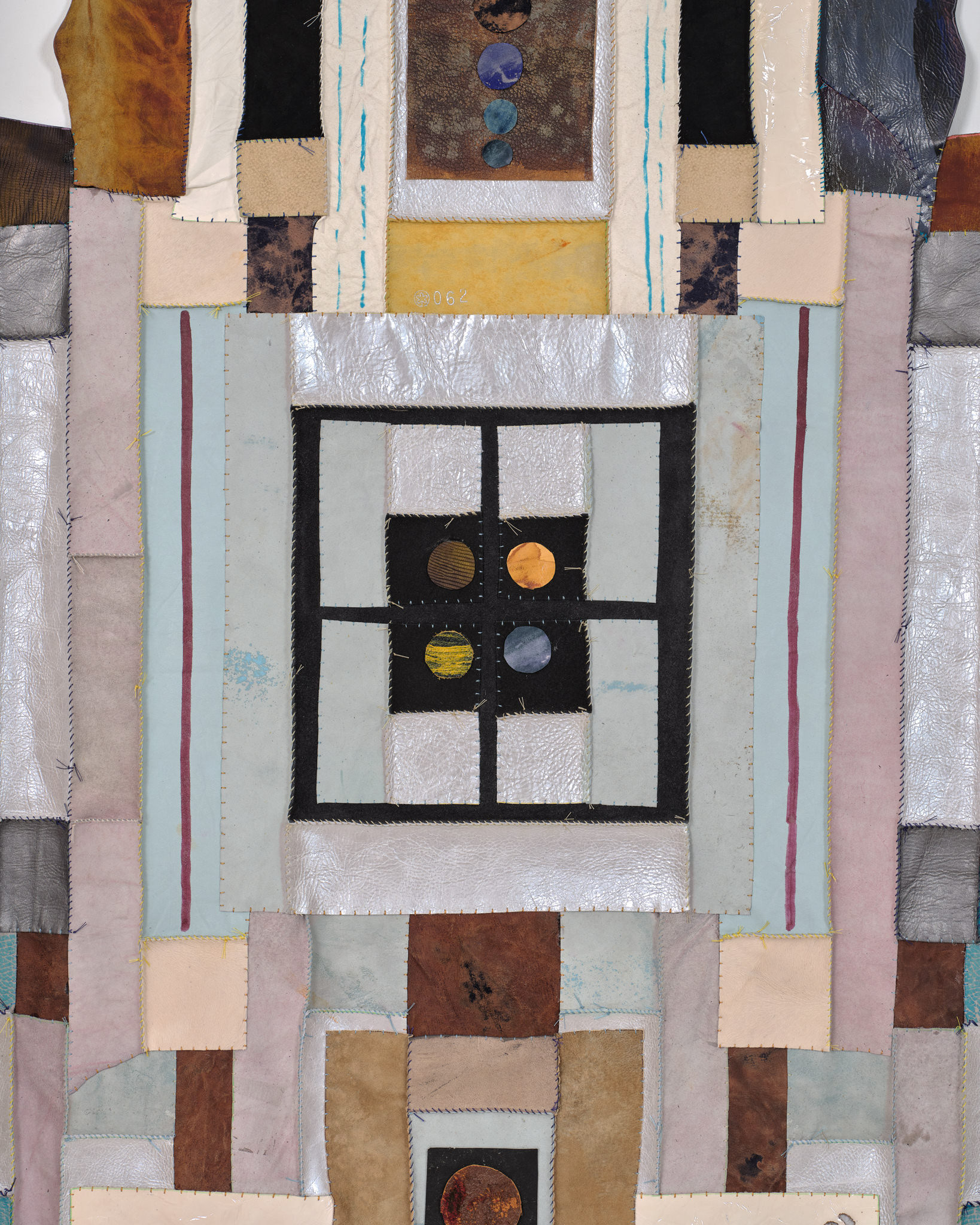 (detail) Gravity, 2024, Repurposed leather and suede, acrylic paint and finisher, leather dye, upholstery tacks, and coated nylon thread, 100H x 47 3/8 inches
