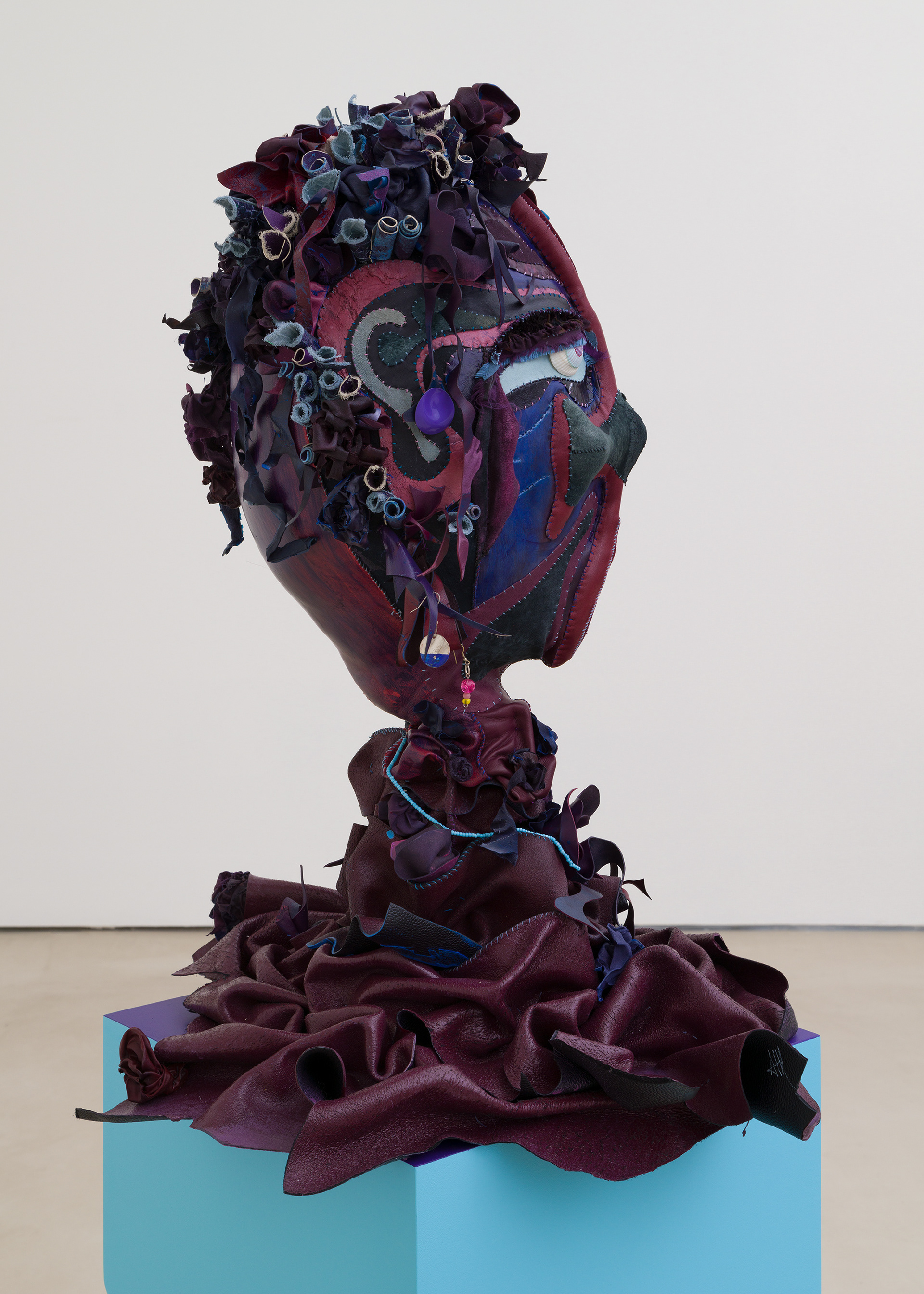 (detail) Venus in Leo, 2023, Steel, wood, enamel paint, acrylic paint, leather dye and finisher, repurposed leather and sueder, repurposed fabric, found jewelry, clam shells and coated nylon thread, 68H x 18 x 18 inches