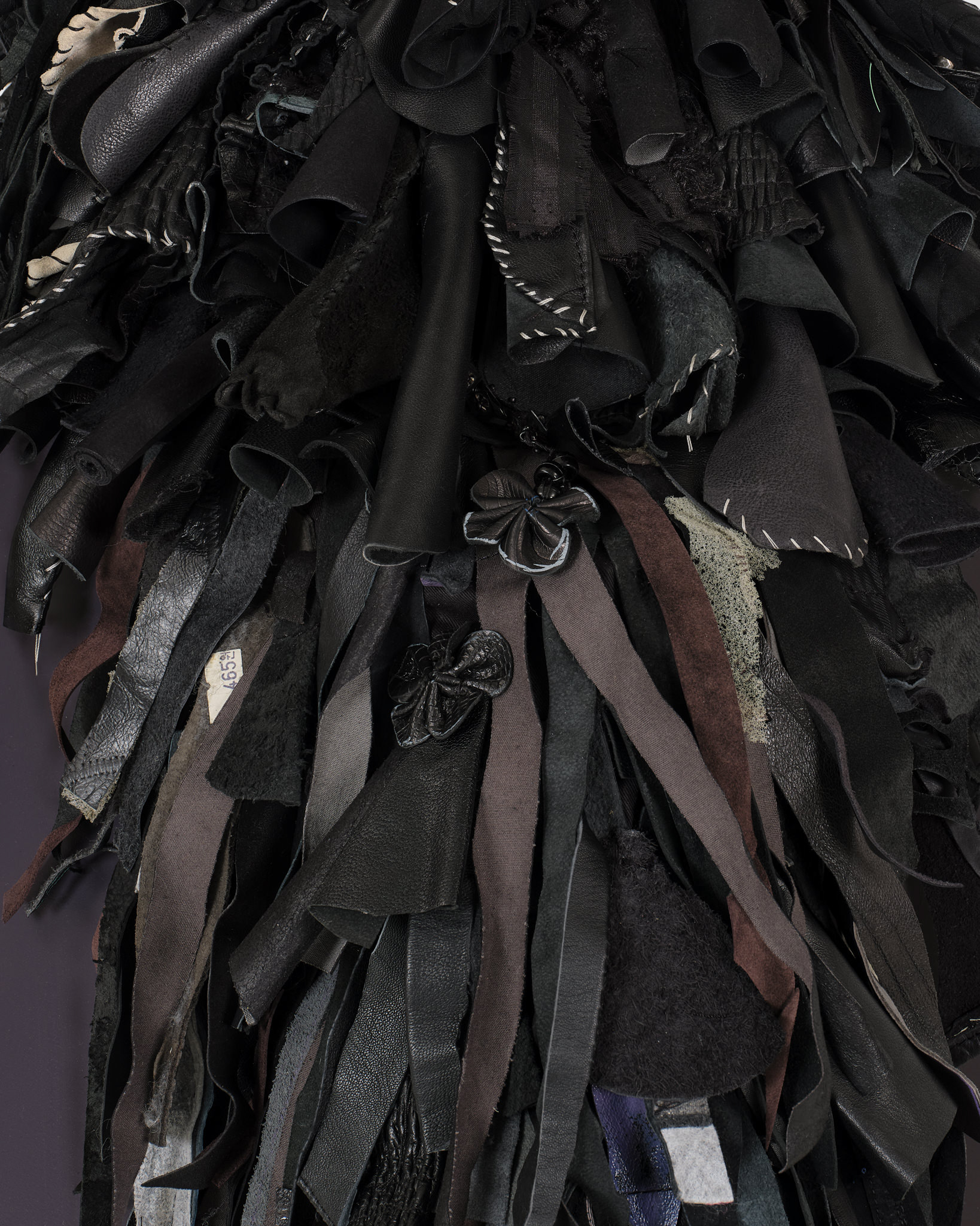(detail) Lilitu, 2024, Steel, wood, enamel paint, repurposed leather, suede and fabric, leather dye, assorted beads, leather cord, wire, and coated nylon thread, 71 H x 32 x 32 inches