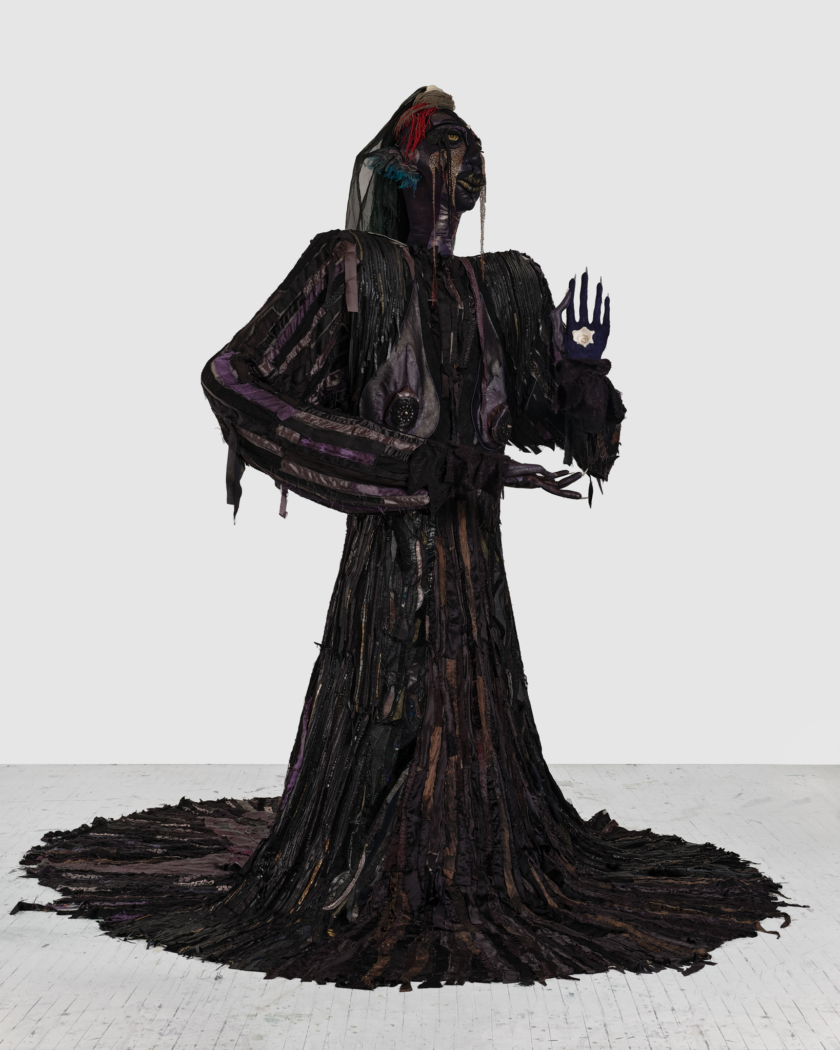 The Night Woman, 2024, Steel; enamel paint; acrylic paint and finisher; repurposed leather, suede, shearling, fur, shagreen, and assorted fabric; leather, fabric, and natural dyes; cow bone; conch; abalone shell; stones; jute; coated nylon thread; and coated cotton thread, 130H x 137 x 106 inches