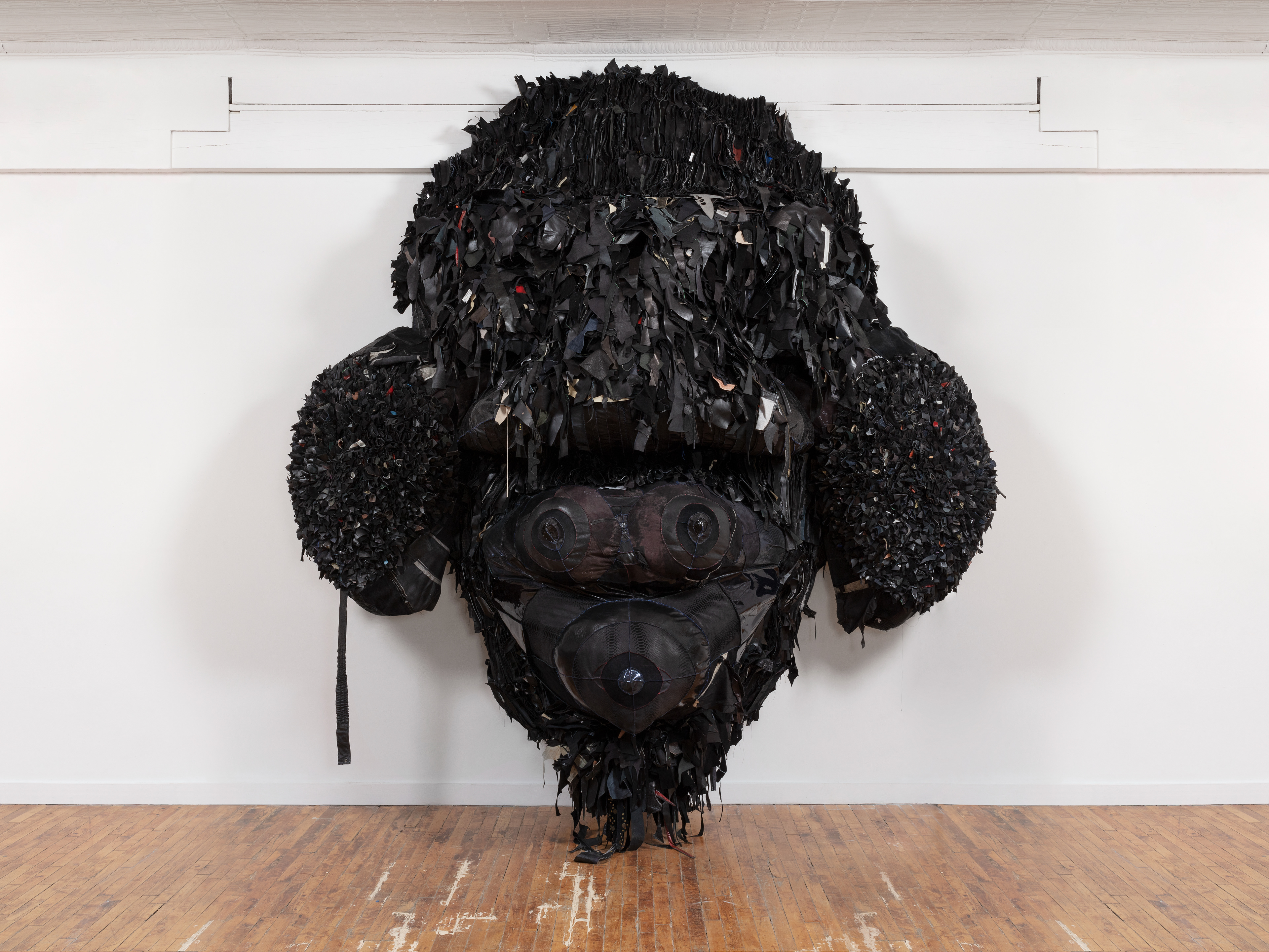 Sol Niger (With my fire, I may destroy everything, by my breath, souls are lifted from putrified earth), 2022 Recycled Leather, Acrylic Paint, Coated Nylon, Steel Armature. 125 x 84 x 49 in (317.5 x 213.36 x 124.46 cm)
